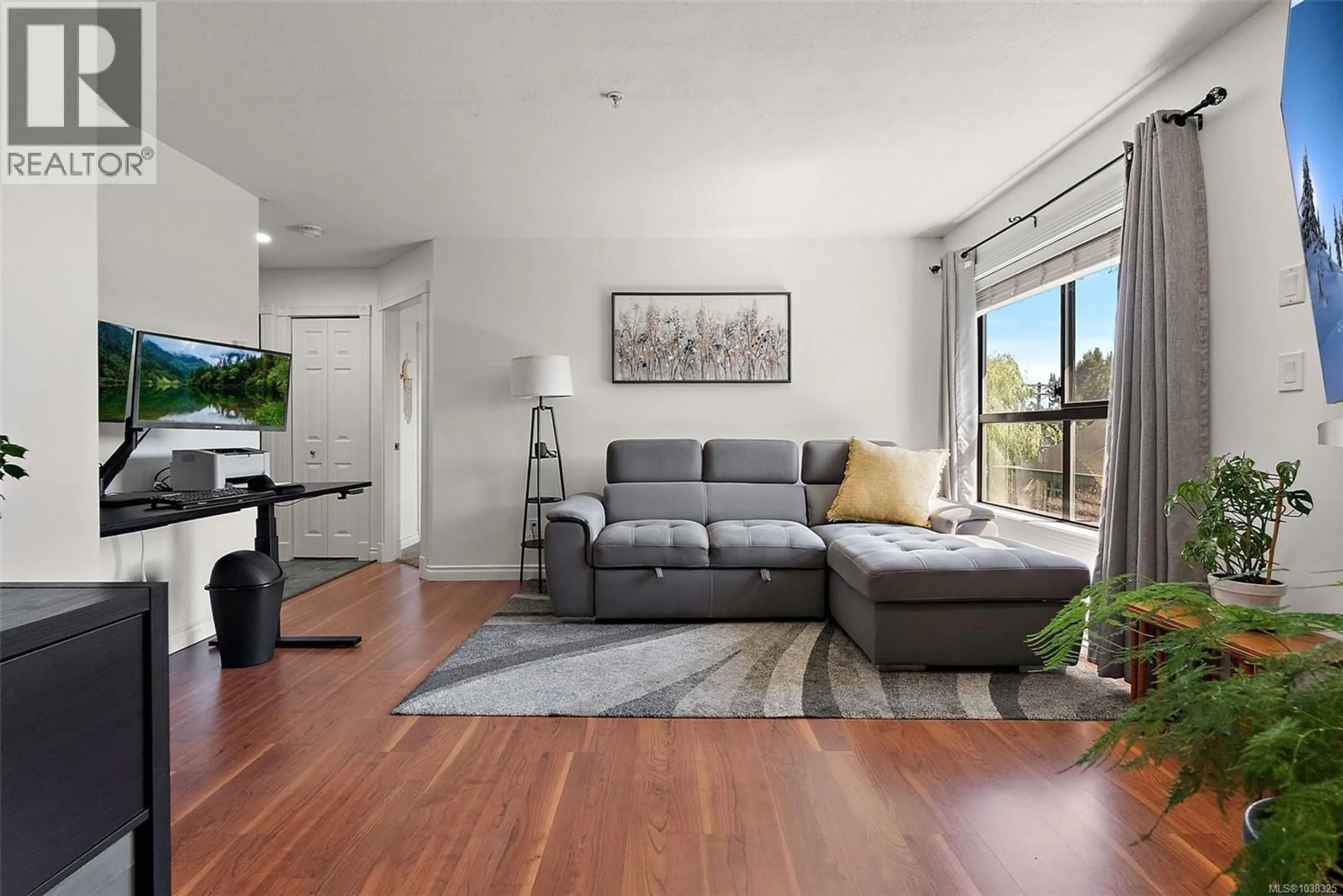 Living room with furniture, unknown for 306 - 7 GORGE ROAD WEST, Saanich British Columbia V9A1L9