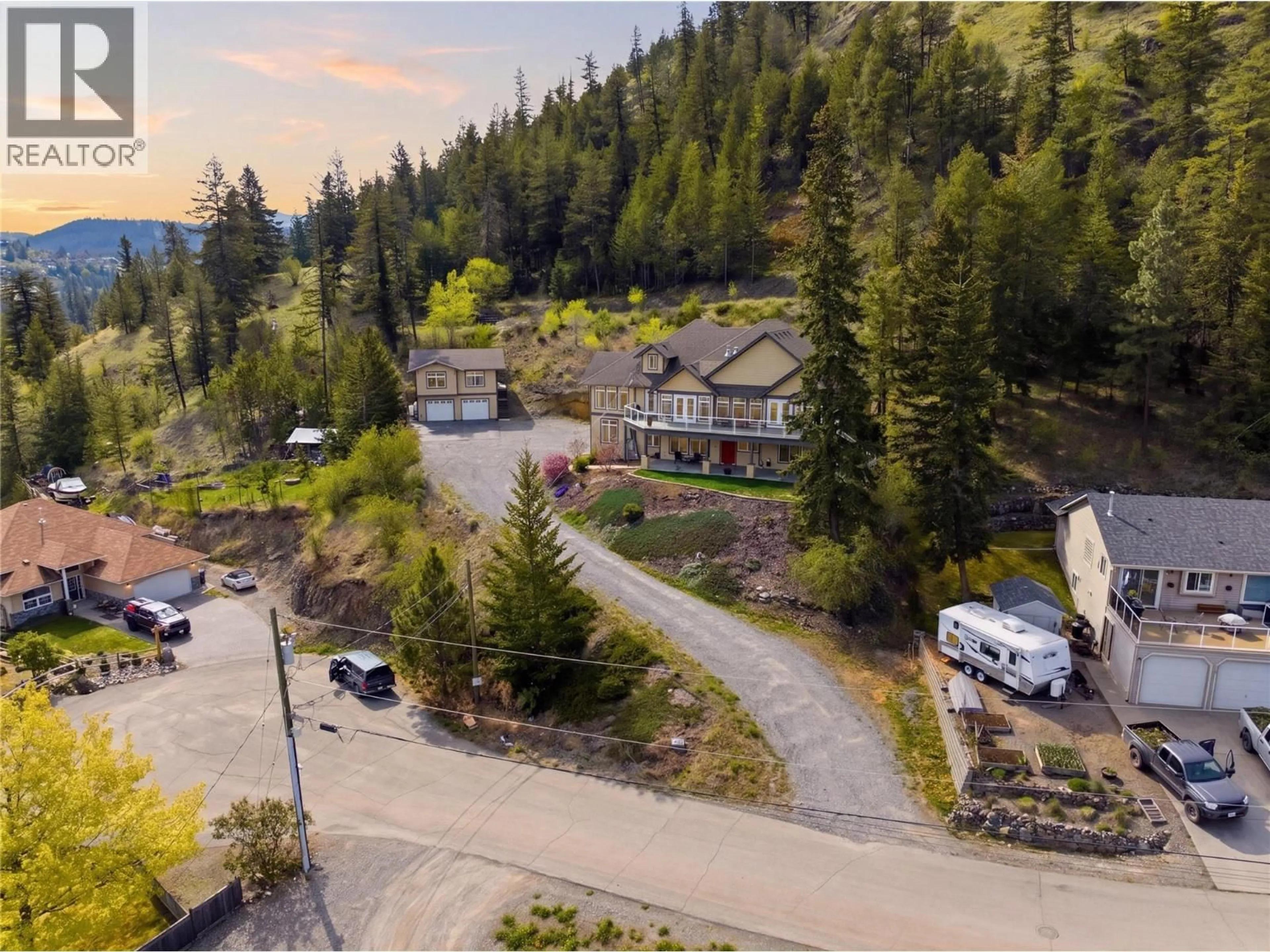 A pic from outside/outdoor area/front of a property/back of a property/a pic from drone, mountain view for 4732 UPLANDS DRIVE, Kamloops British Columbia V2C6S9