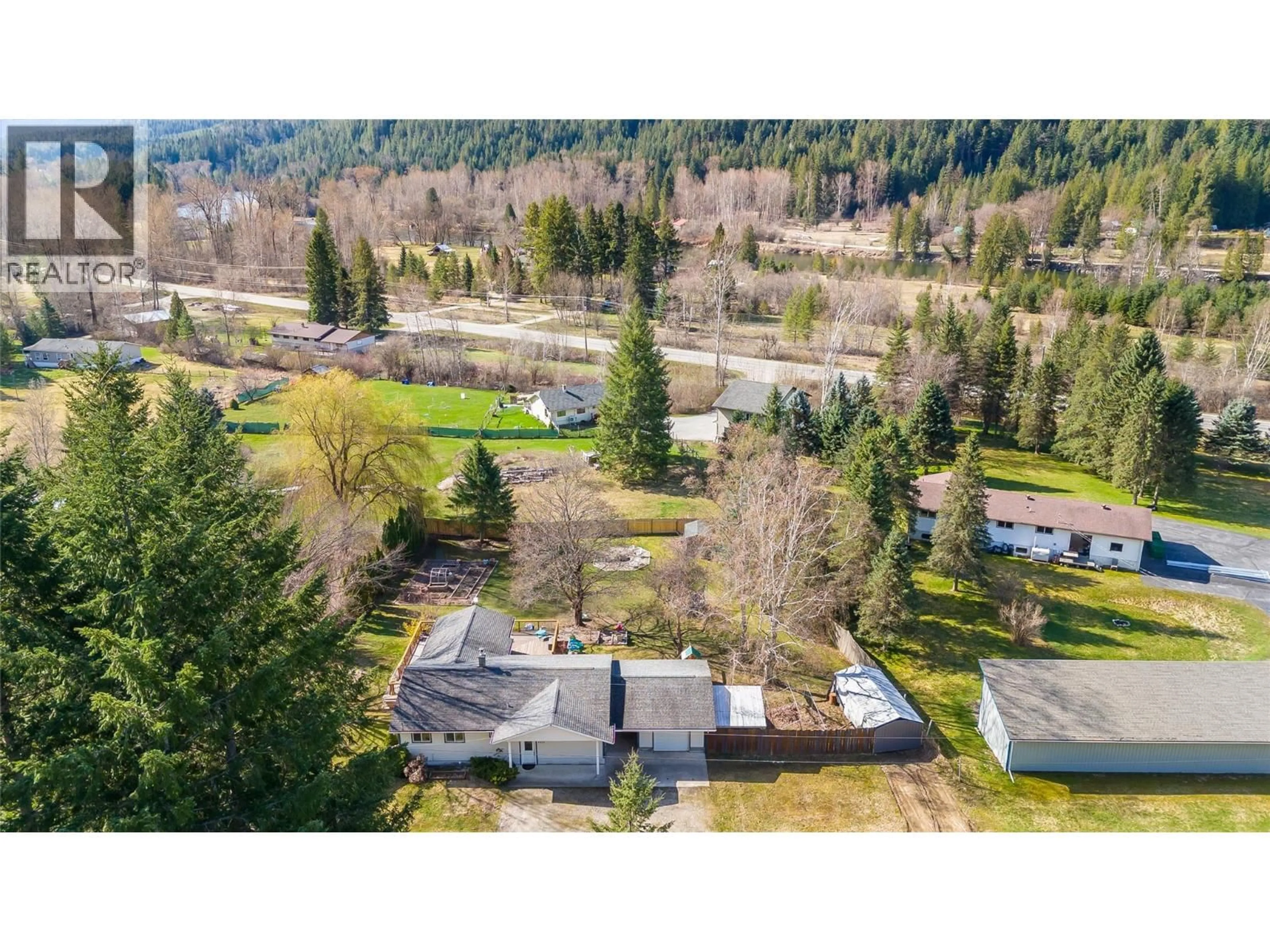 A pic from outside/outdoor area/front of a property/back of a property/a pic from drone, forest/trees view for 2451 CUNNINGHAM ROAD, Slocan Park British Columbia V0G2E0
