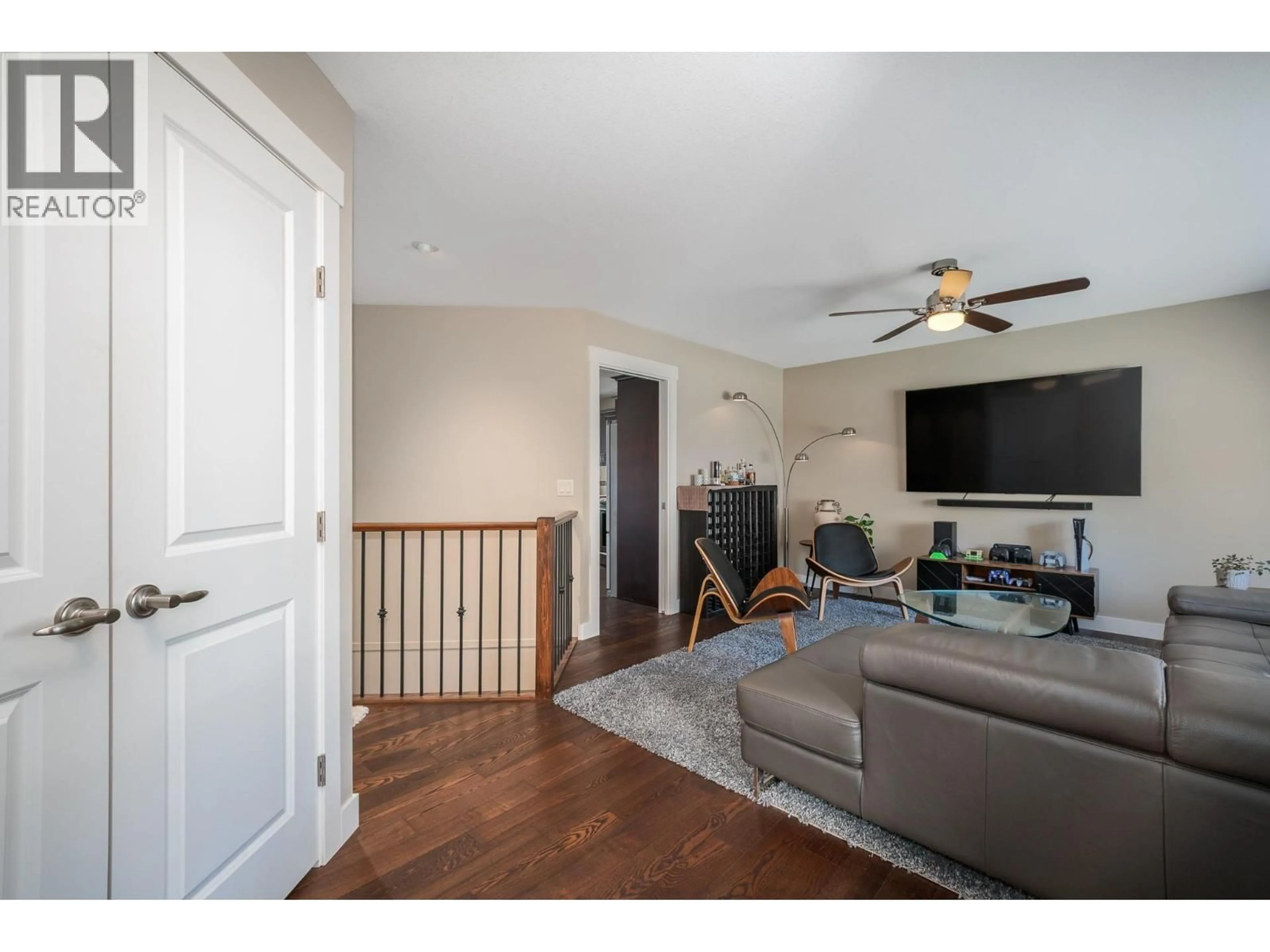 Living room with furniture, wood/laminate floor for 1915 ROSEALEE LANE, West Kelowna British Columbia V1Z4C7