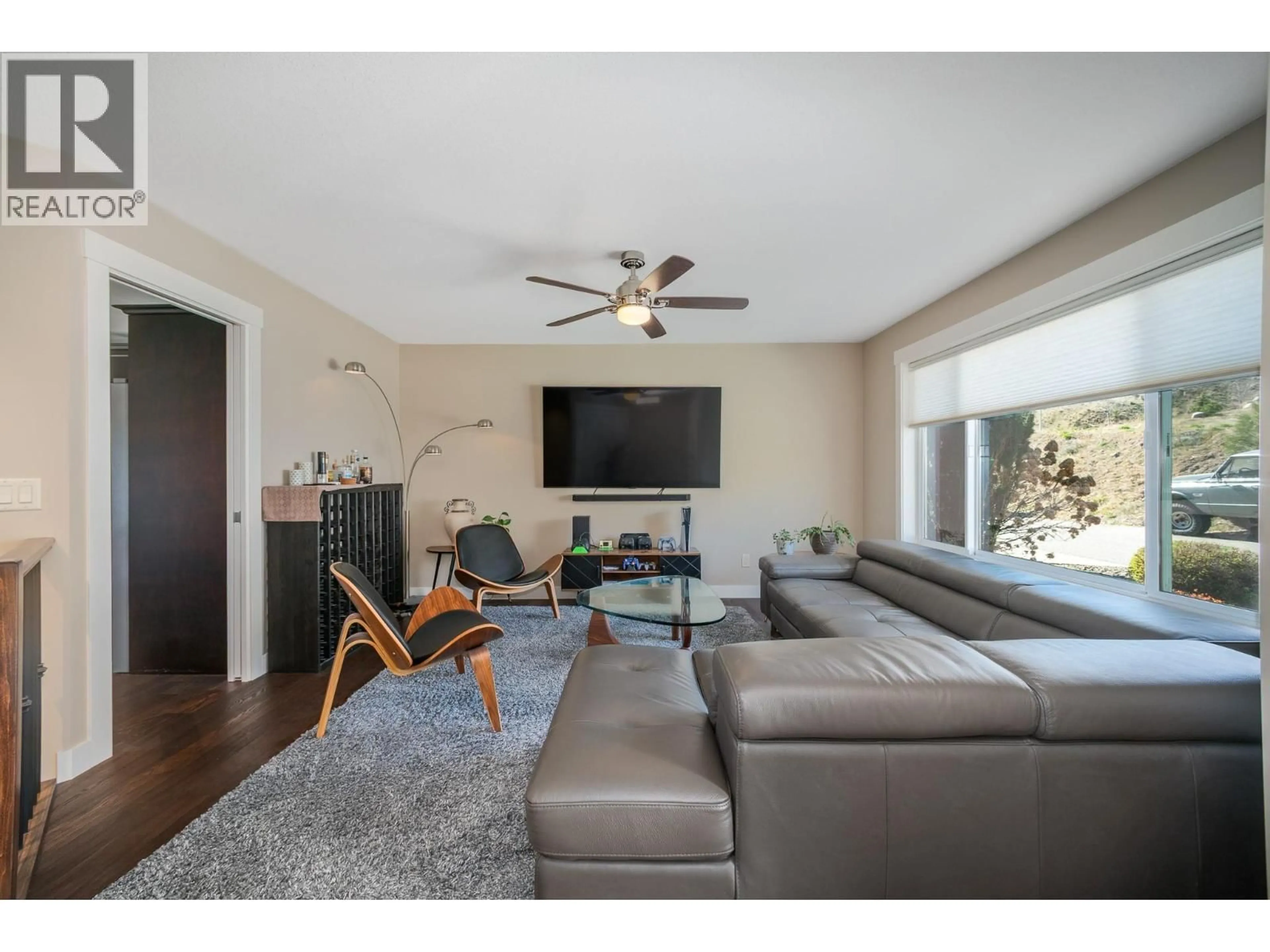 Living room with furniture, wood/laminate floor for 1915 ROSEALEE LANE, West Kelowna British Columbia V1Z4C7