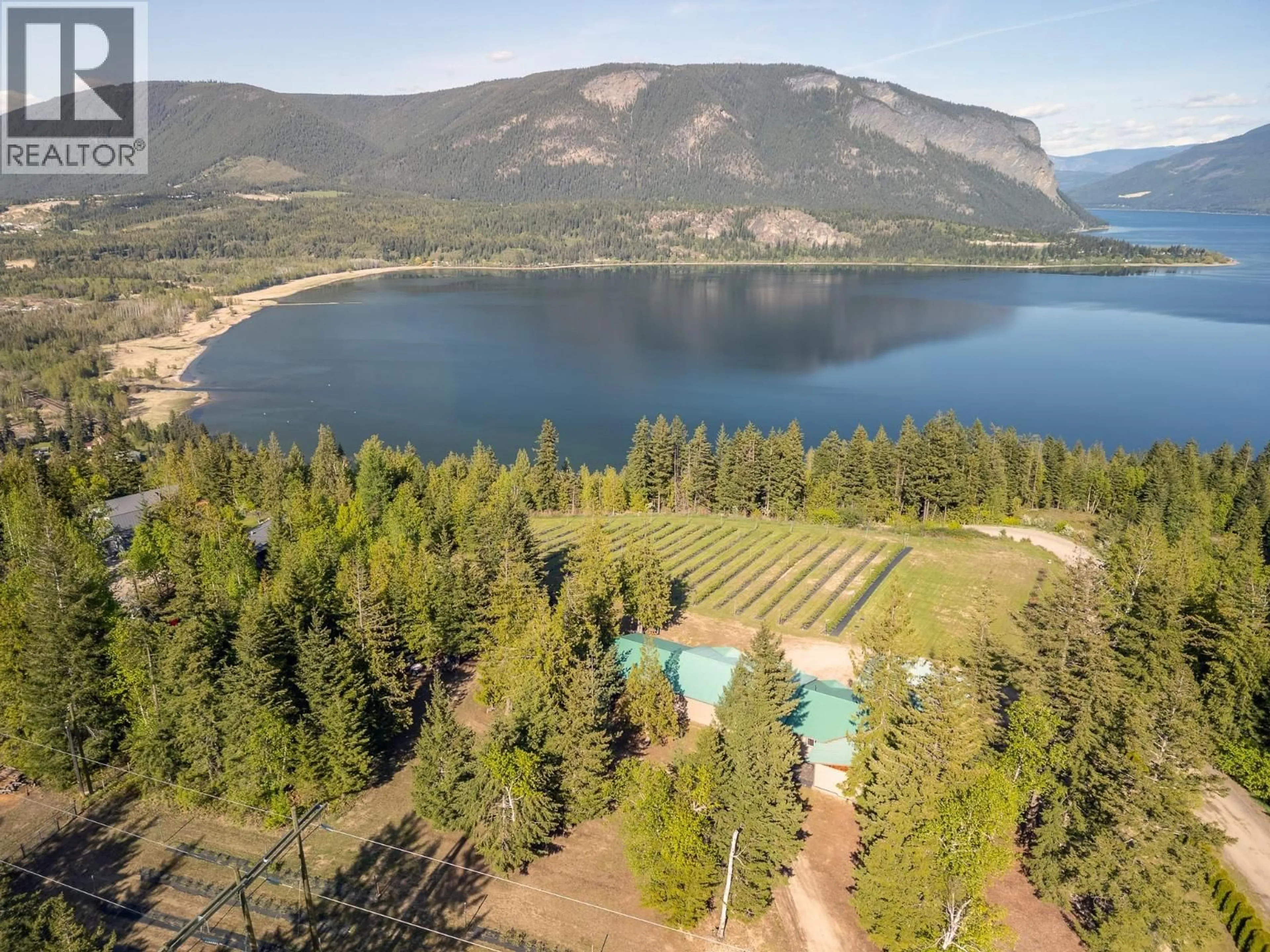 A pic from outside/outdoor area/front of a property/back of a property/a pic from drone, water/lake/river/ocean view for 285 KAULT HILL ROAD, Salmon Arm British Columbia V1E3A4