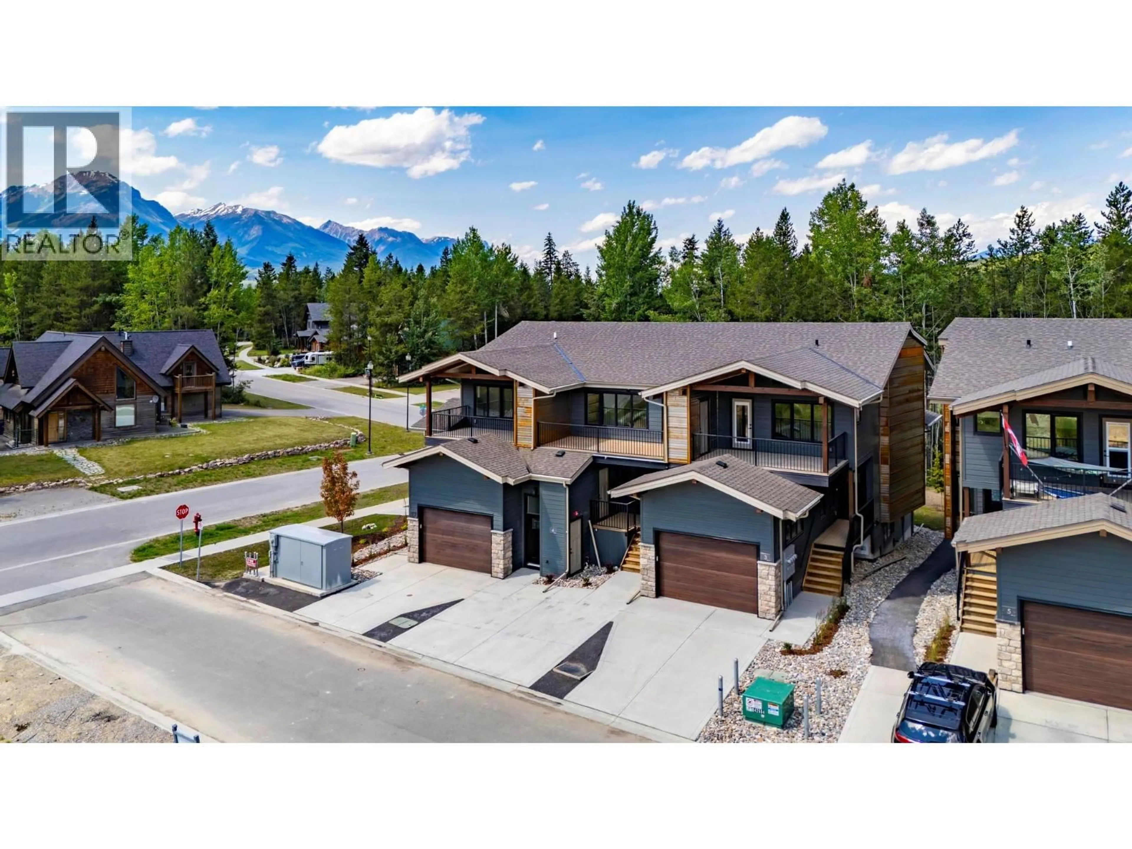 A pic from outside/outdoor area/front of a property/back of a property/a pic from drone, mountain view for 2 - 1444 GRANITE DRIVE, Golden British Columbia V0A1H0