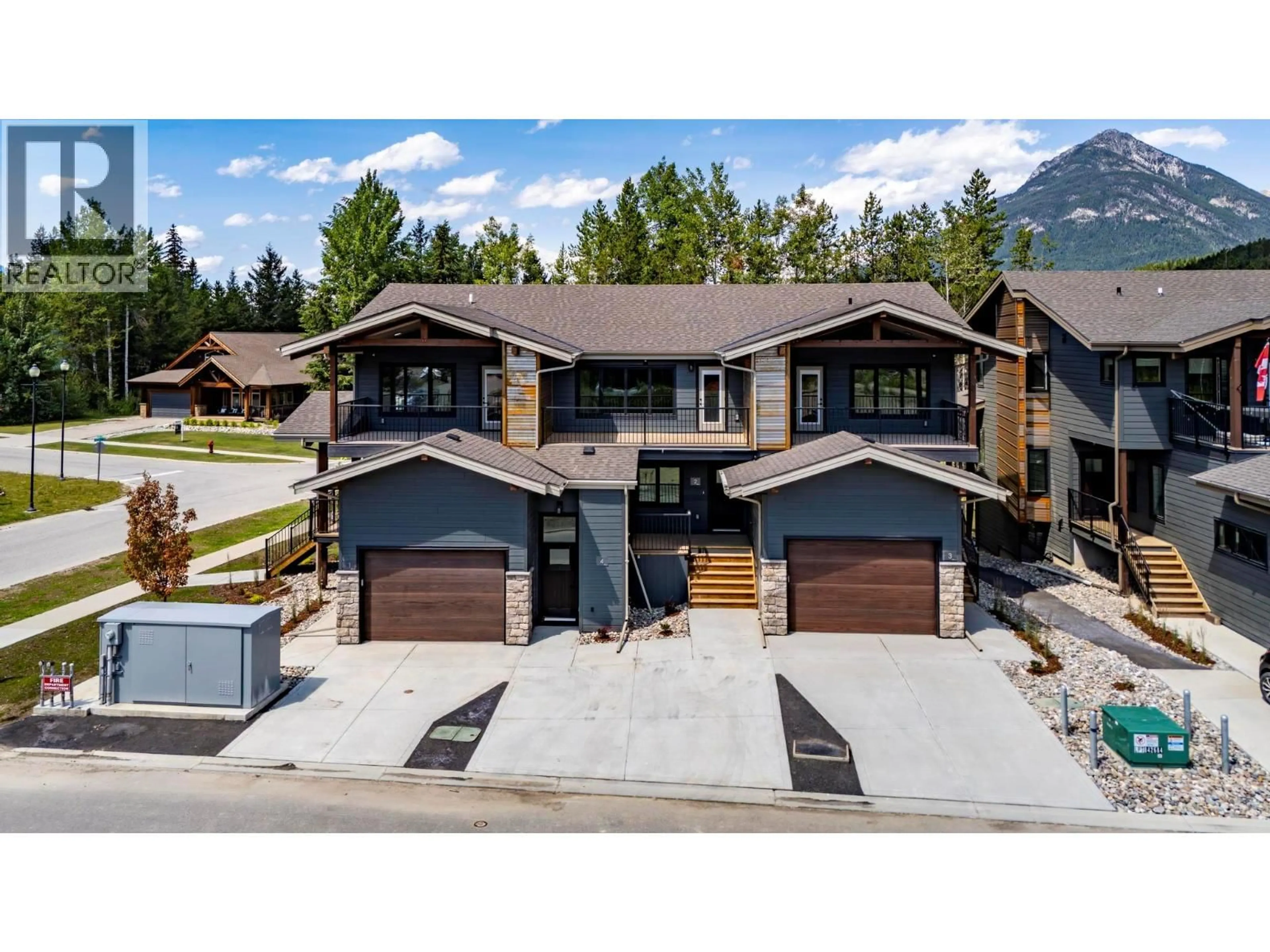 A pic from outside/outdoor area/front of a property/back of a property/a pic from drone, mountain view for 2 - 1444 GRANITE DRIVE, Golden British Columbia V0A1H0