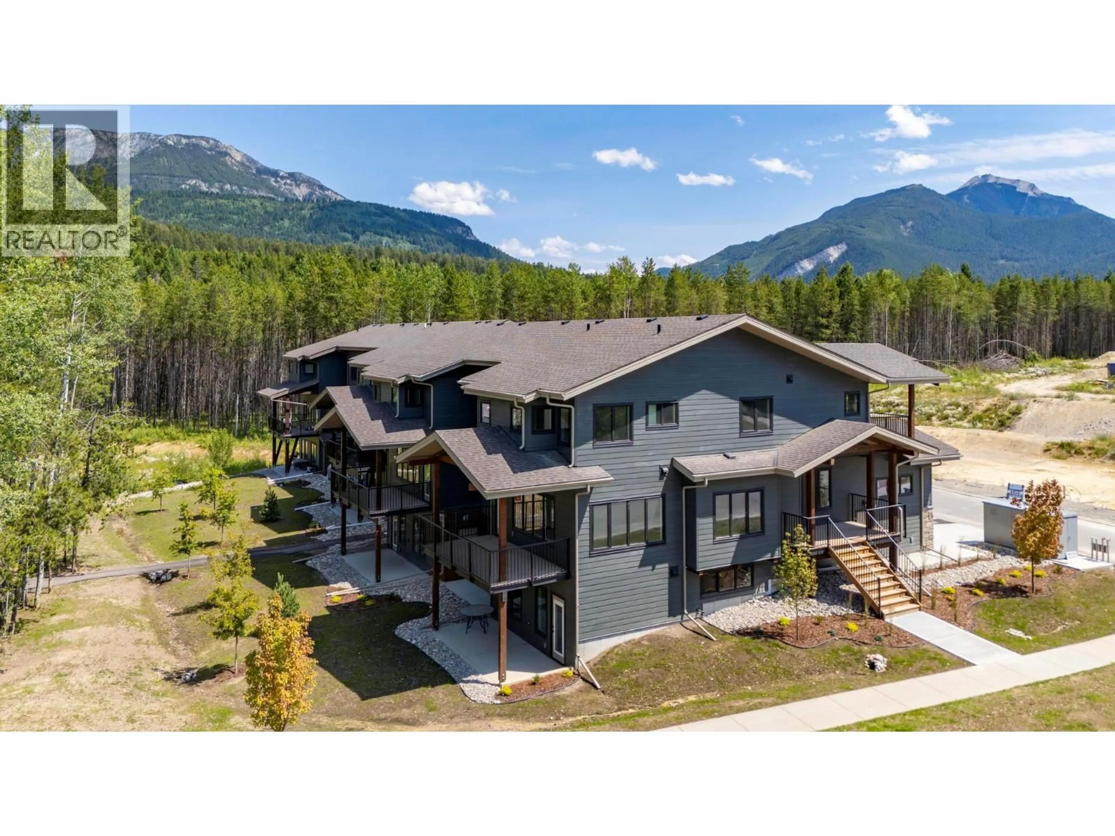 A pic from outside/outdoor area/front of a property/back of a property/a pic from drone, mountain view for 2 - 1444 GRANITE DRIVE, Golden British Columbia V0A1H0