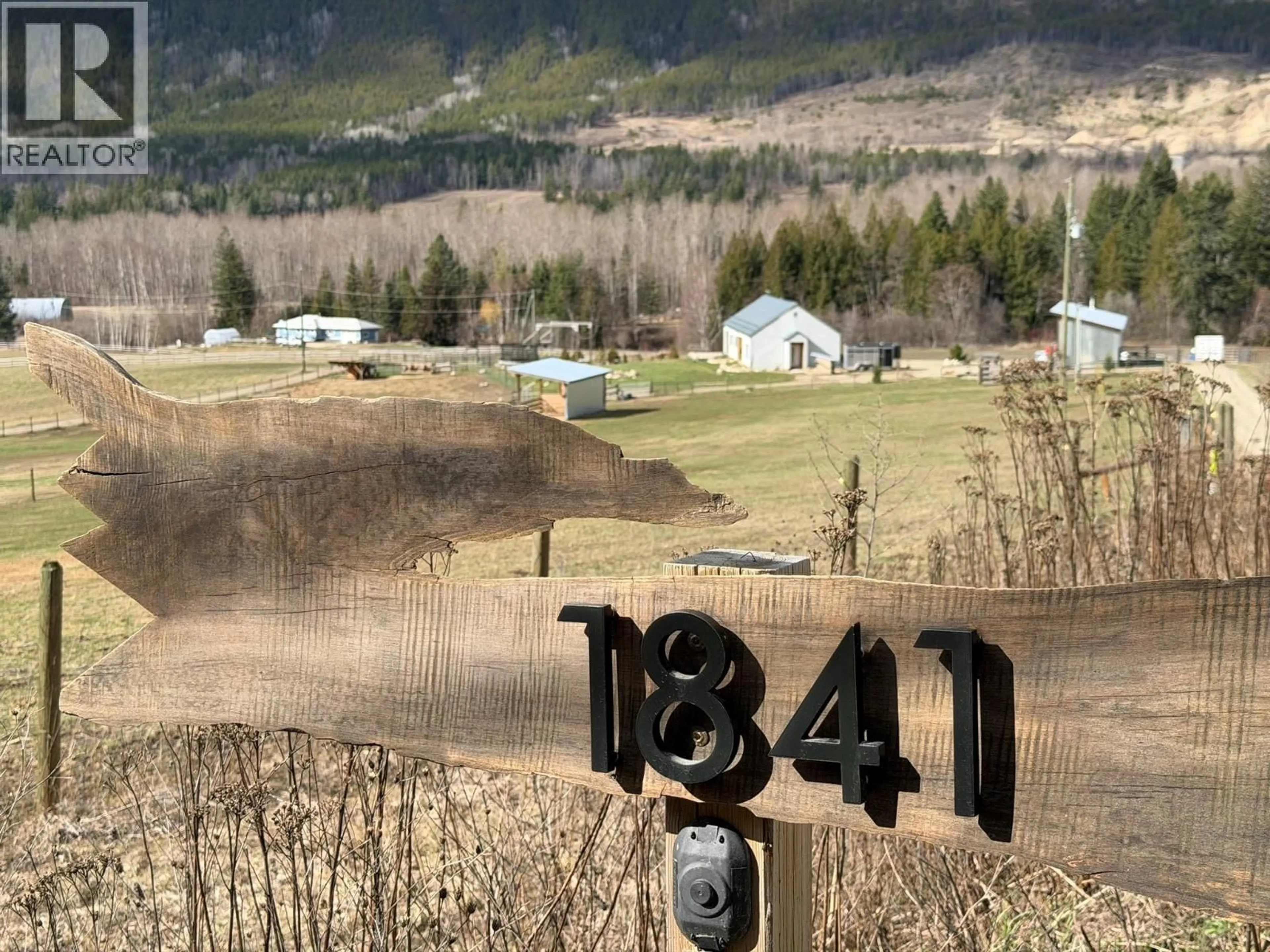 A pic from outside/outdoor area/front of a property/back of a property/a pic from drone, mountain view for 1841 50 STREET NORTHWEST, Salmon Arm British Columbia V1E3B1