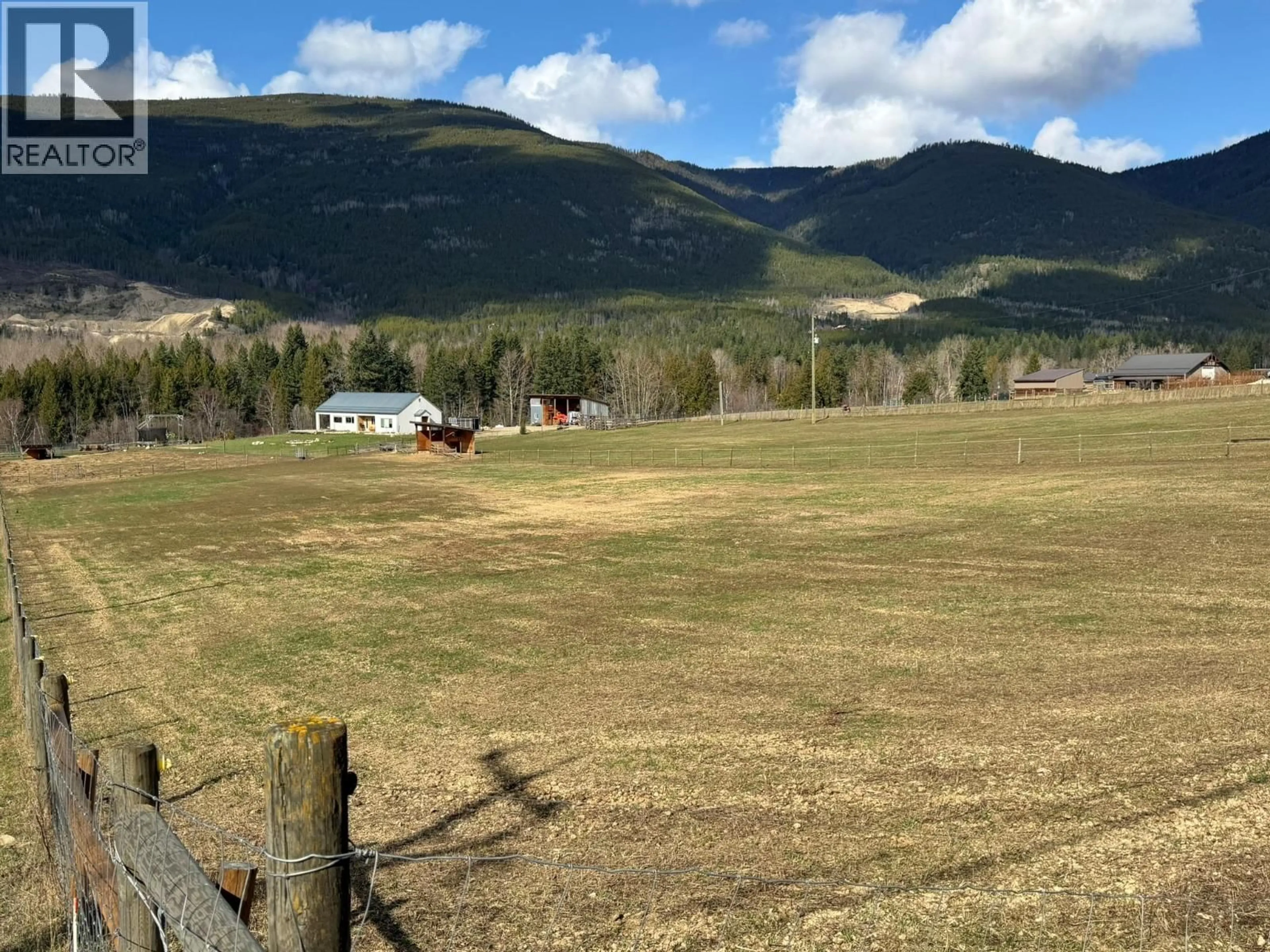 A pic from outside/outdoor area/front of a property/back of a property/a pic from drone, mountain view for 1841 50 STREET NORTHWEST, Salmon Arm British Columbia V1E3B1