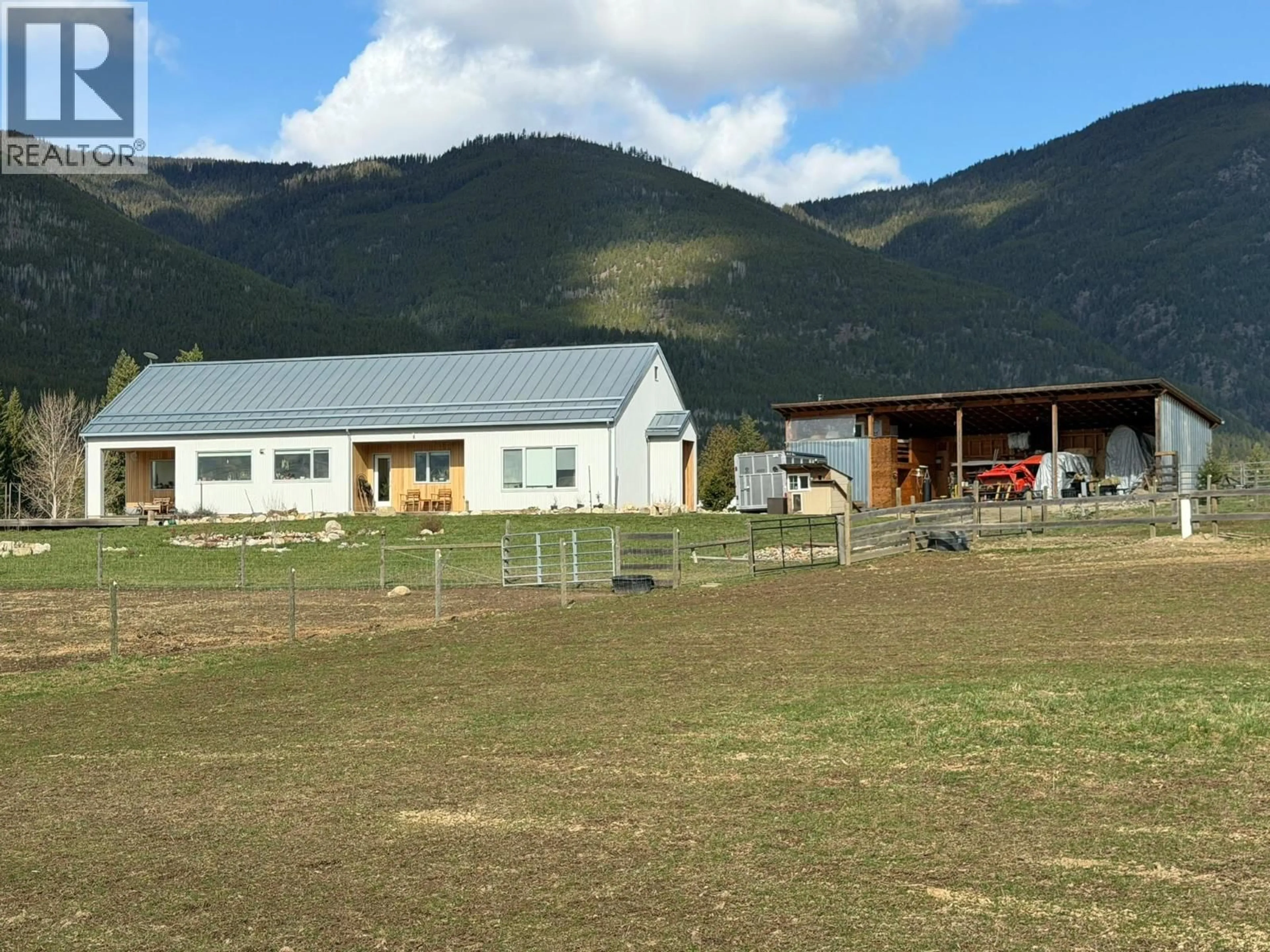 A pic from outside/outdoor area/front of a property/back of a property/a pic from drone, mountain view for 1841 50 STREET NORTHWEST, Salmon Arm British Columbia V1E3B1