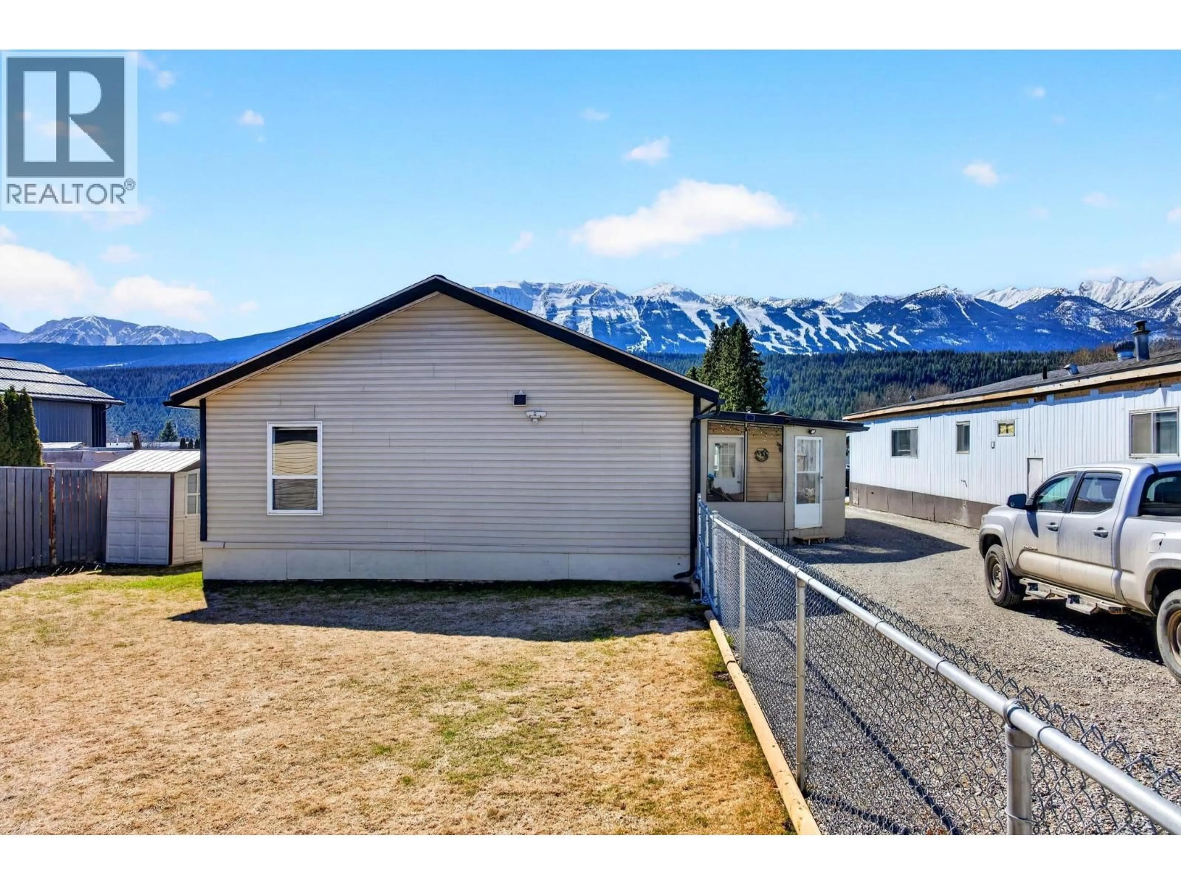 A pic from outside/outdoor area/front of a property/back of a property/a pic from drone, mountain view for 91 - 1036 11TH STREET NORTH, Golden British Columbia V0A1H0