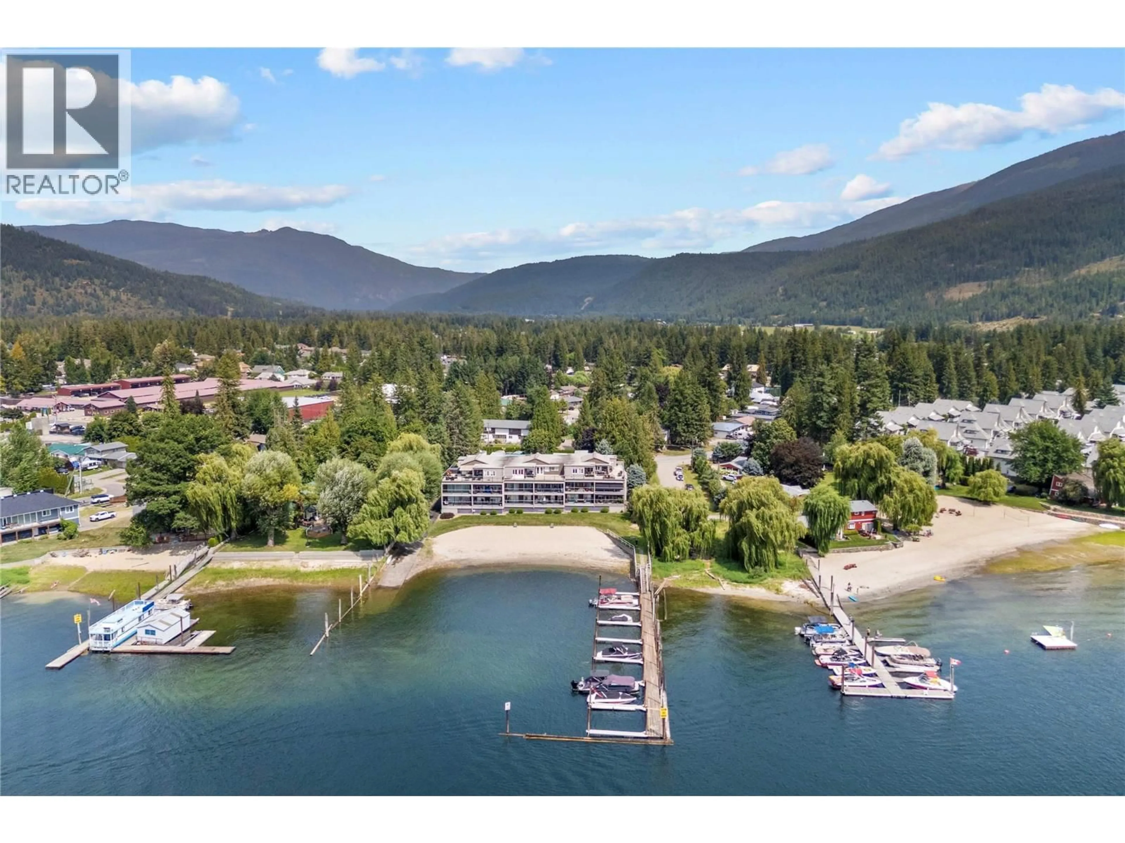 A pic from outside/outdoor area/front of a property/back of a property/a pic from drone, water/lake/river/ocean view for 8 - 100 ARCHIBALD STREET, Sicamous British Columbia V0E2V1