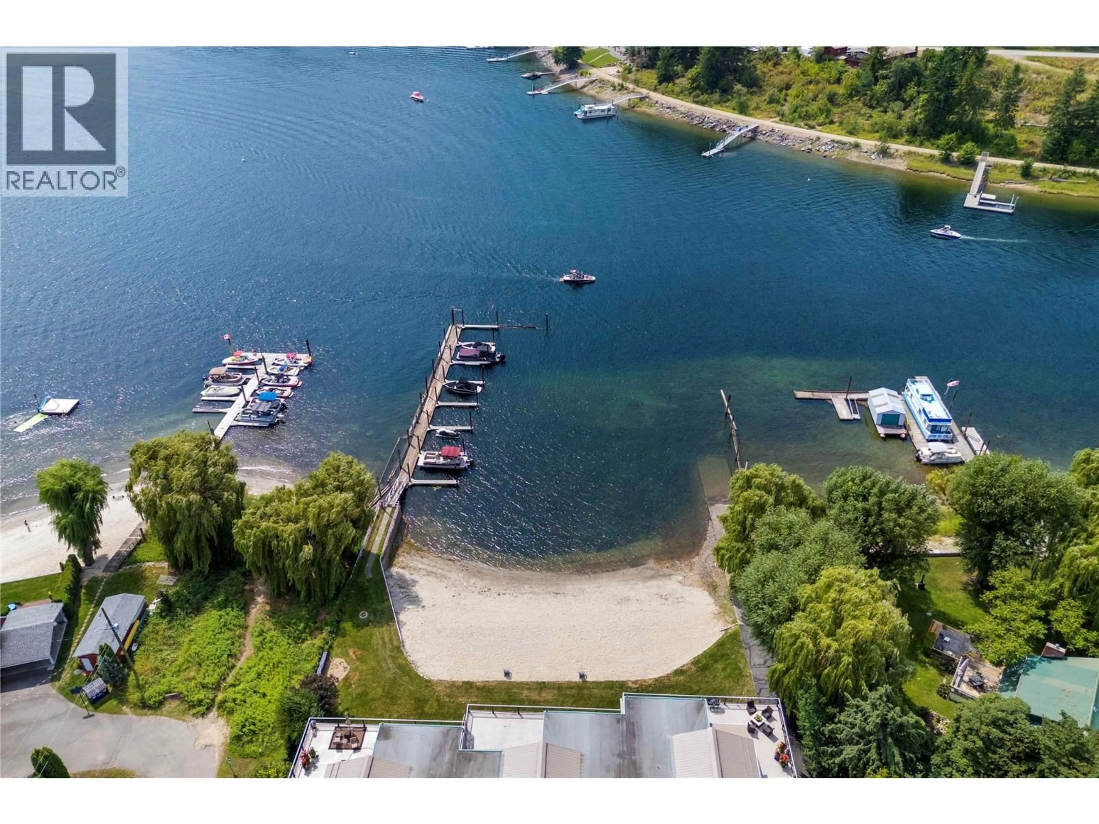 A pic from outside/outdoor area/front of a property/back of a property/a pic from drone, water/lake/river/ocean view for 8 - 100 ARCHIBALD STREET, Sicamous British Columbia V0E2V1