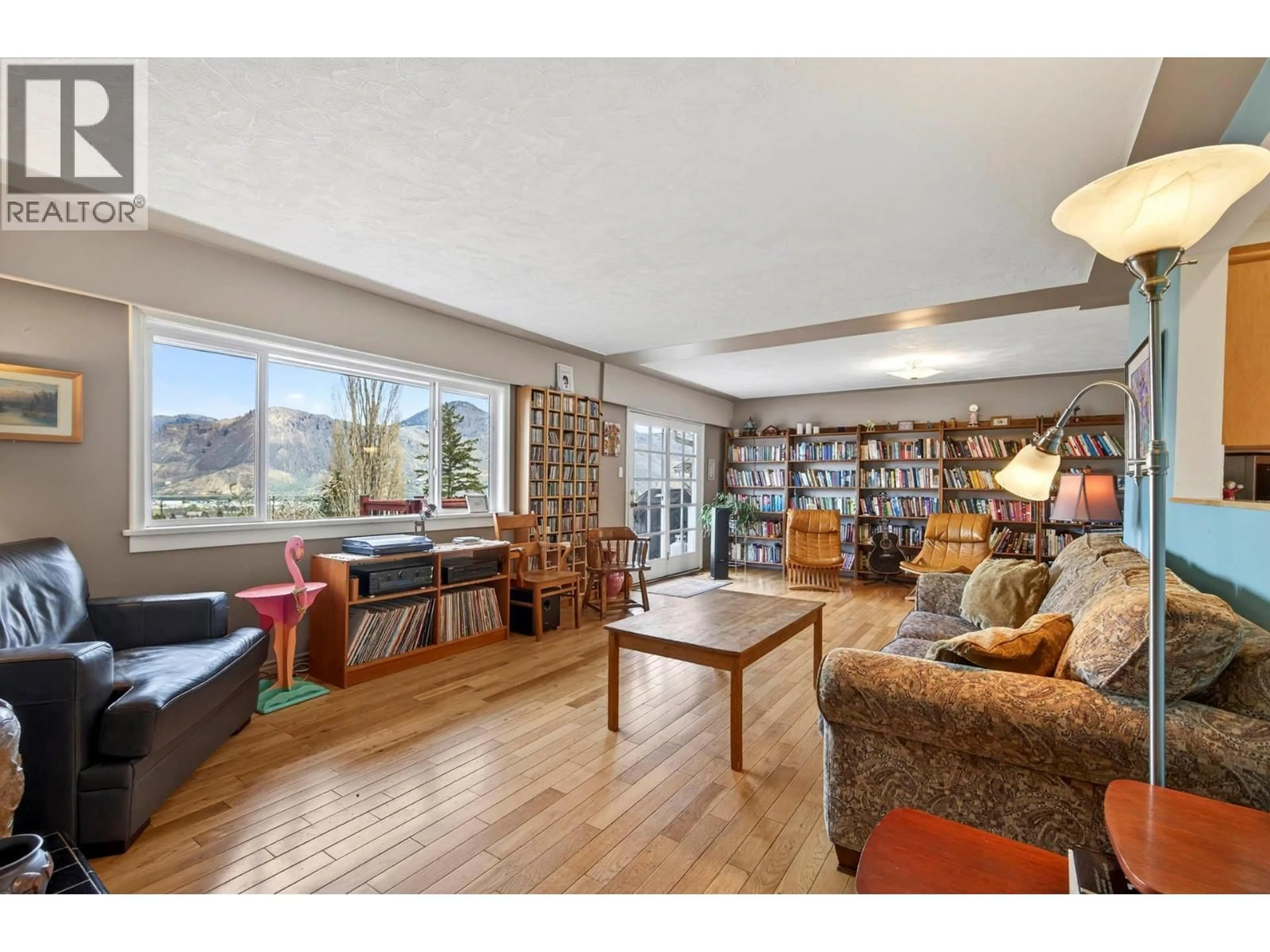 Living room with furniture, wood/laminate floor for 640 FRASER STREET, Kamloops British Columbia V2C3H2