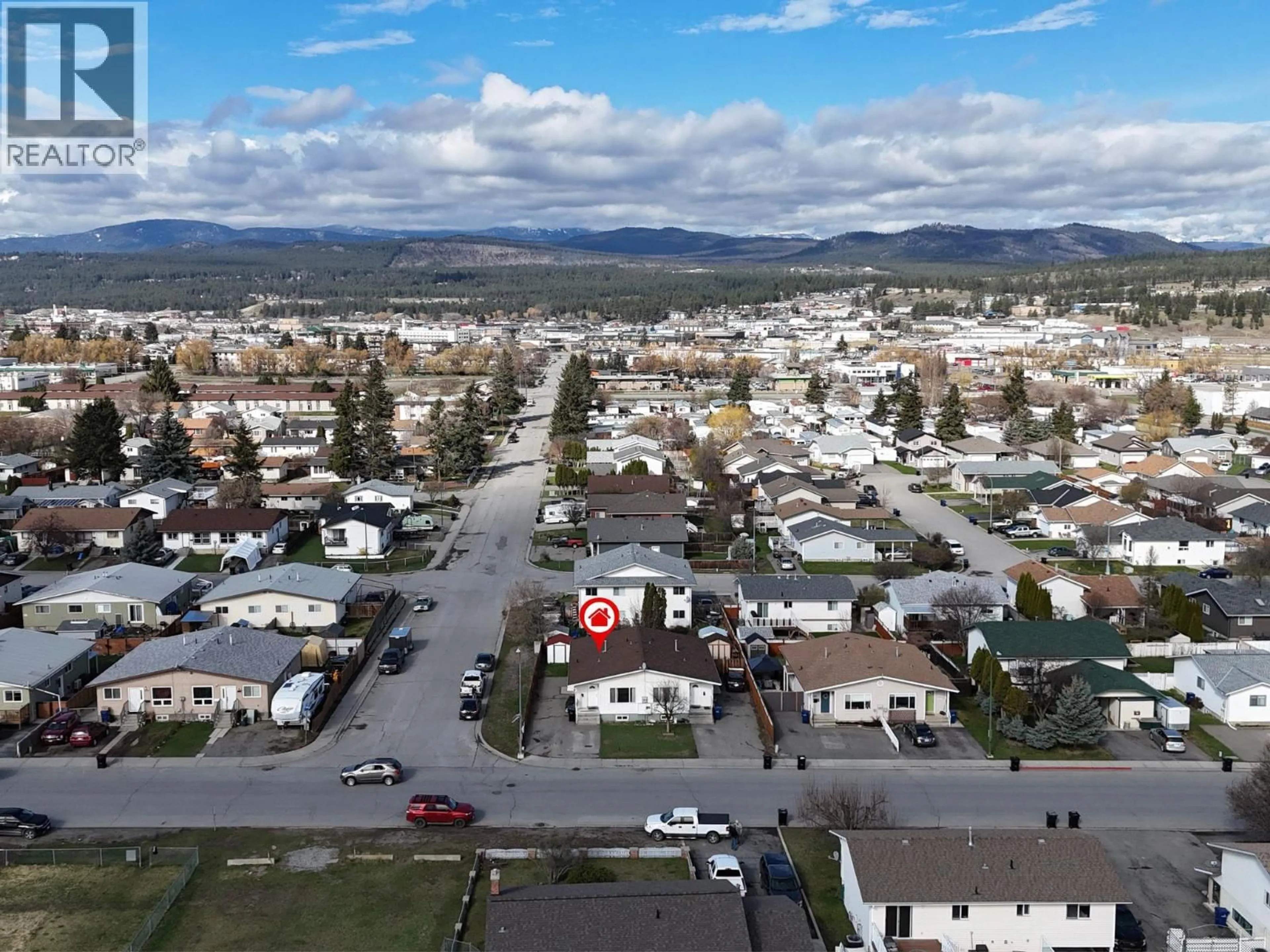 A pic from outside/outdoor area/front of a property/back of a property/a pic from drone, mountain view for 801 24TH AVENUE NORTH, Cranbrook British Columbia V1C6J4