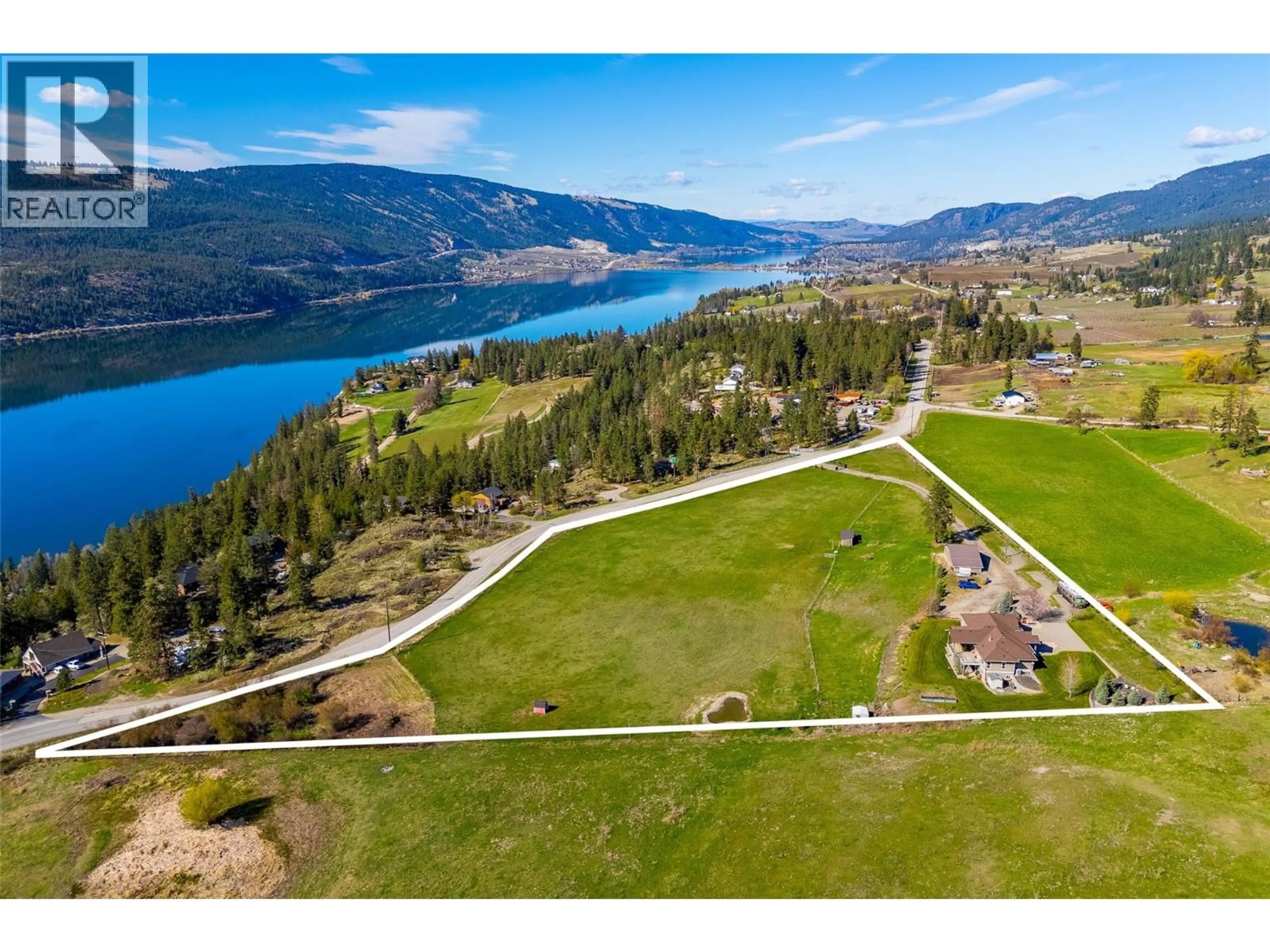 A pic from outside/outdoor area/front of a property/back of a property/a pic from drone, water/lake/river/ocean view for 12435 OYAMA ROAD, Lake Country British Columbia V4V2A4
