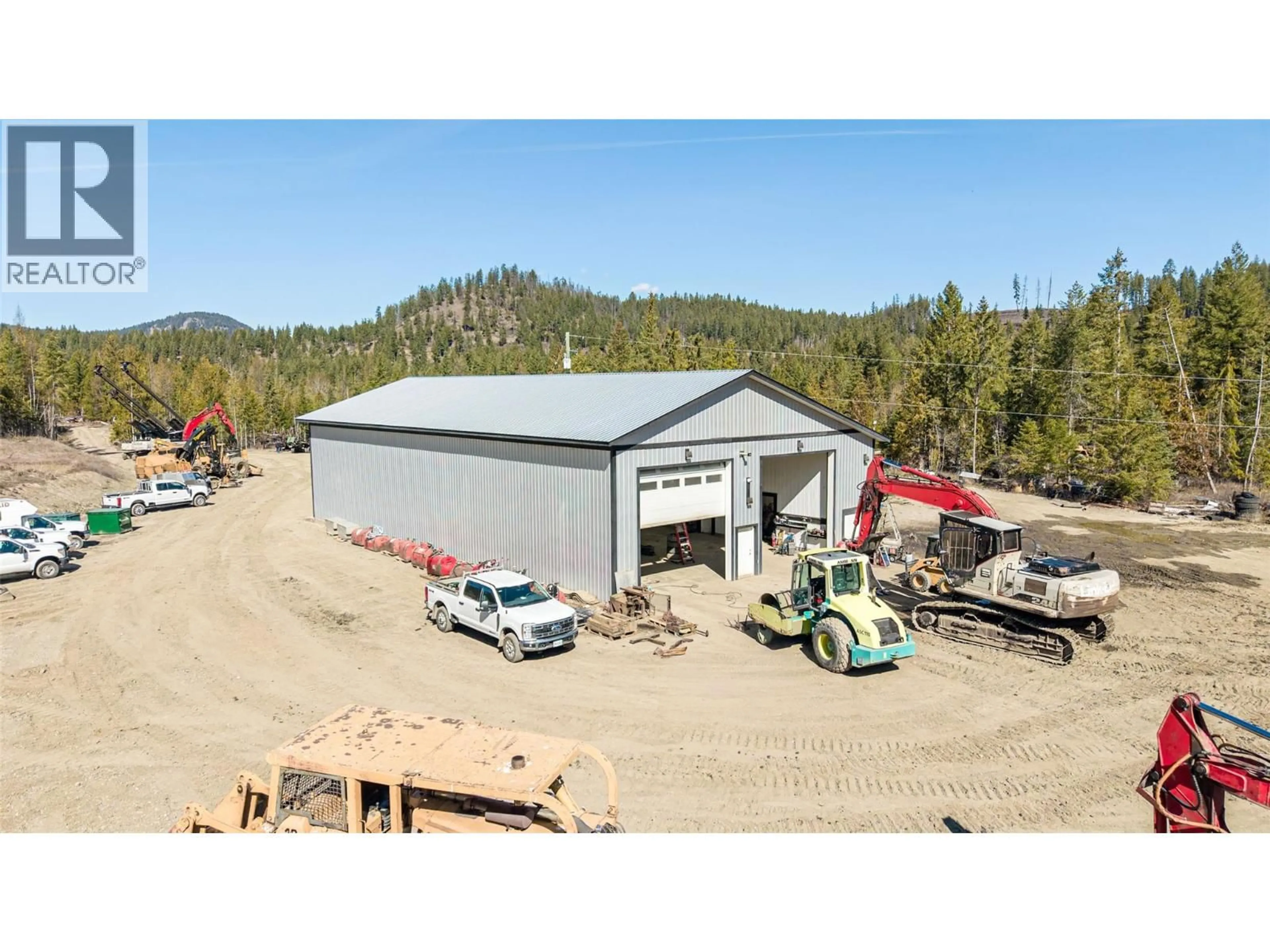 A pic from outside/outdoor area/front of a property/back of a property/a pic from drone, building for 40 GIBSON ROAD, Lumby British Columbia V0E2G0