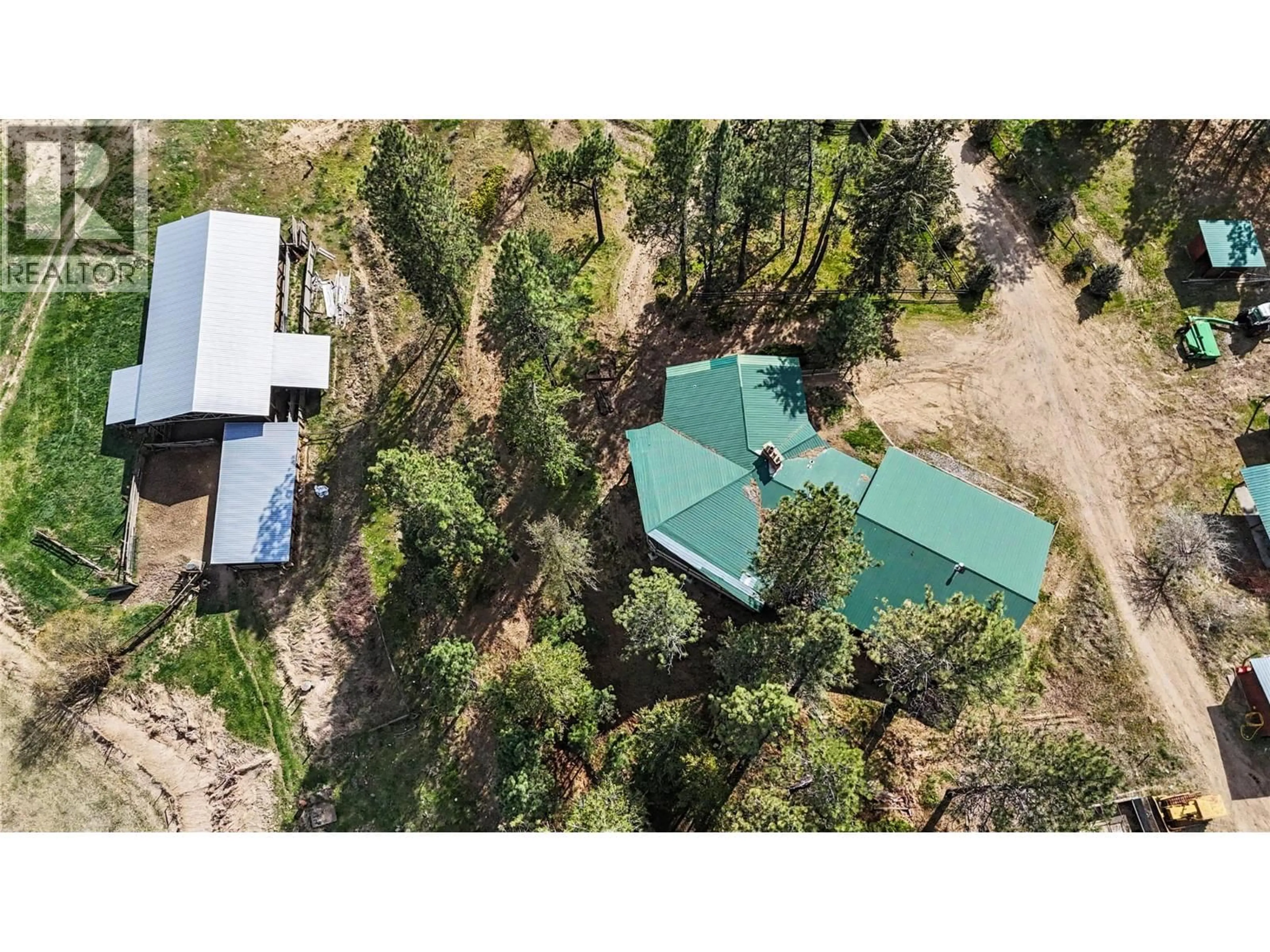 A pic from outside/outdoor area/front of a property/back of a property/a pic from drone, forest/trees view for 8810 NORTH FORK ROAD, Grand Forks British Columbia V0H1H2