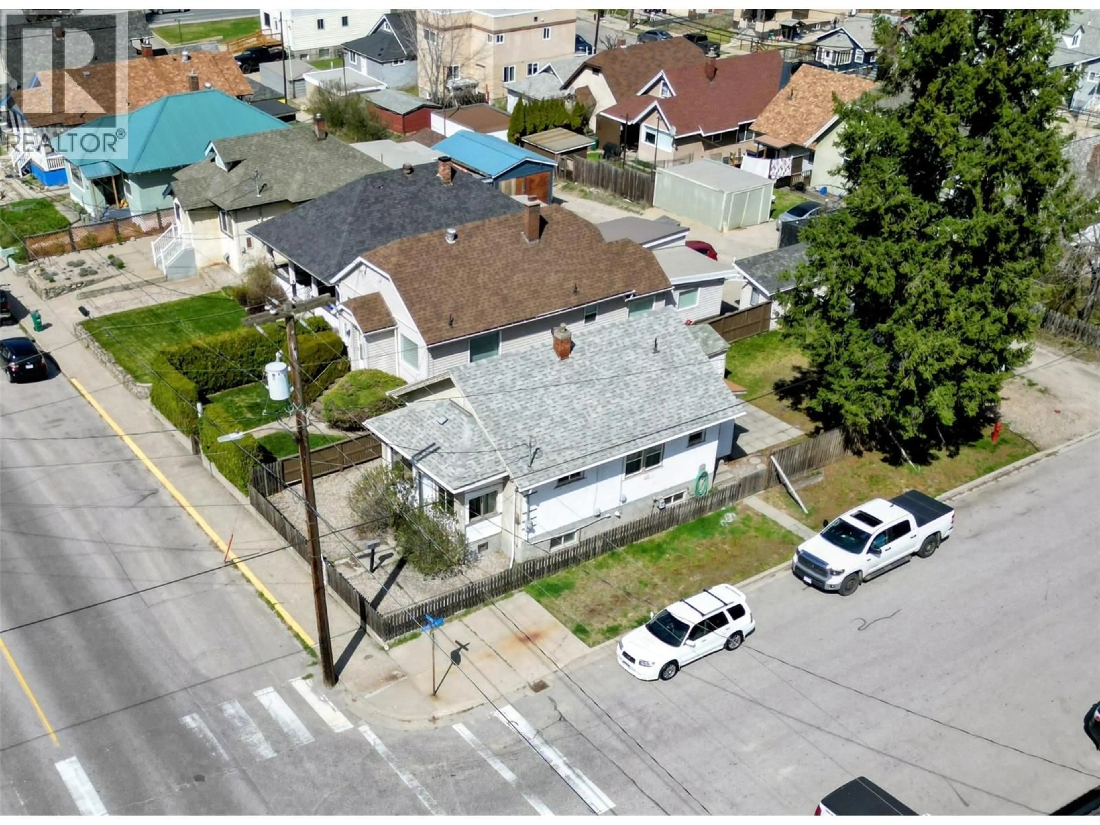 A pic from outside/outdoor area/front of a property/back of a property/a pic from drone, street for 1497 SECOND AVENUE, Trail British Columbia V1R1M1