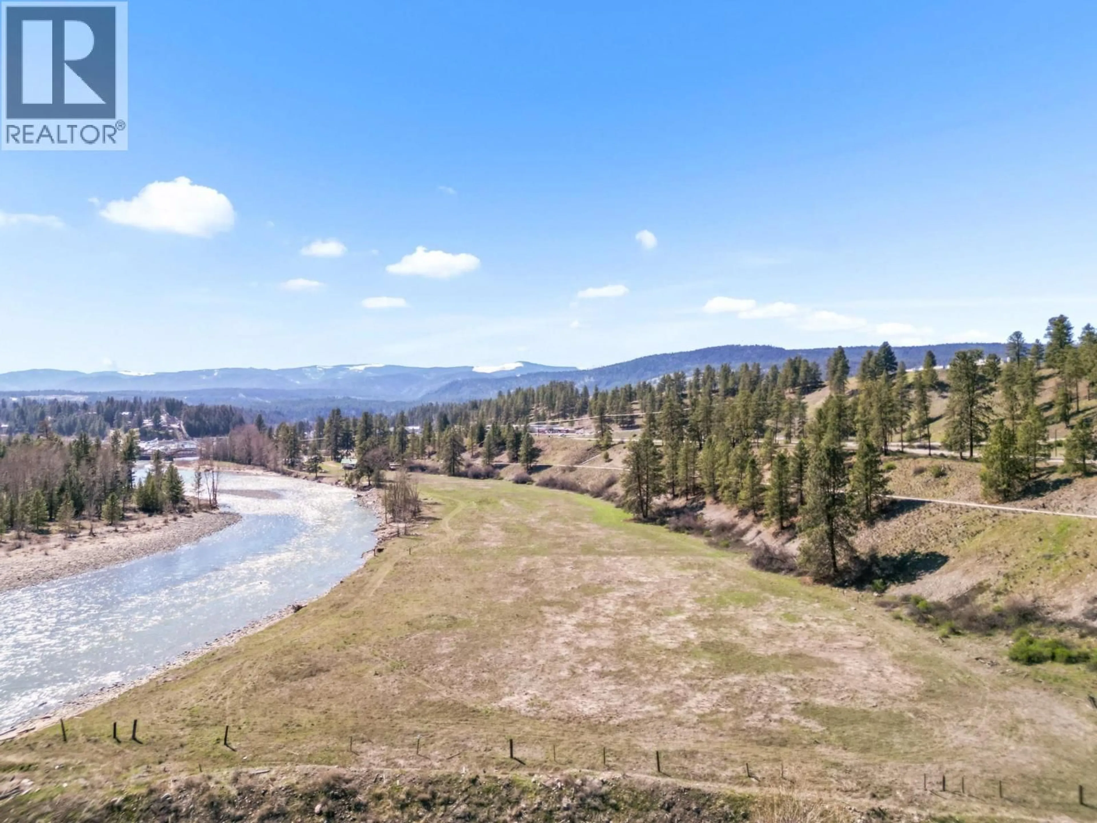 A pic from outside/outdoor area/front of a property/back of a property/a pic from drone, water/lake/river/ocean view for 202 A,B,C 5A HIGHWAY, Princeton British Columbia V0X1W0