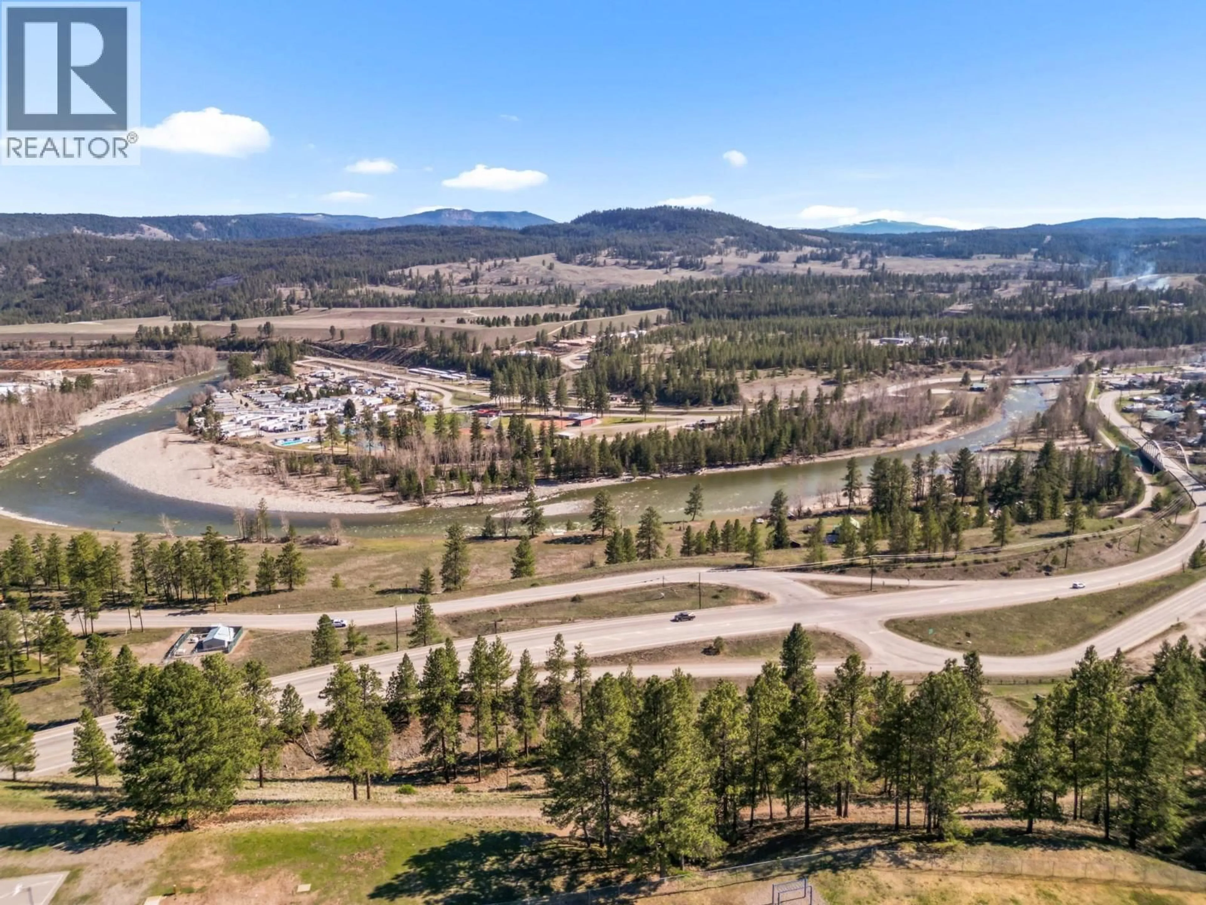 A pic from outside/outdoor area/front of a property/back of a property/a pic from drone, mountain view for 202 A,B,C 5A HIGHWAY, Princeton British Columbia V0X1W0