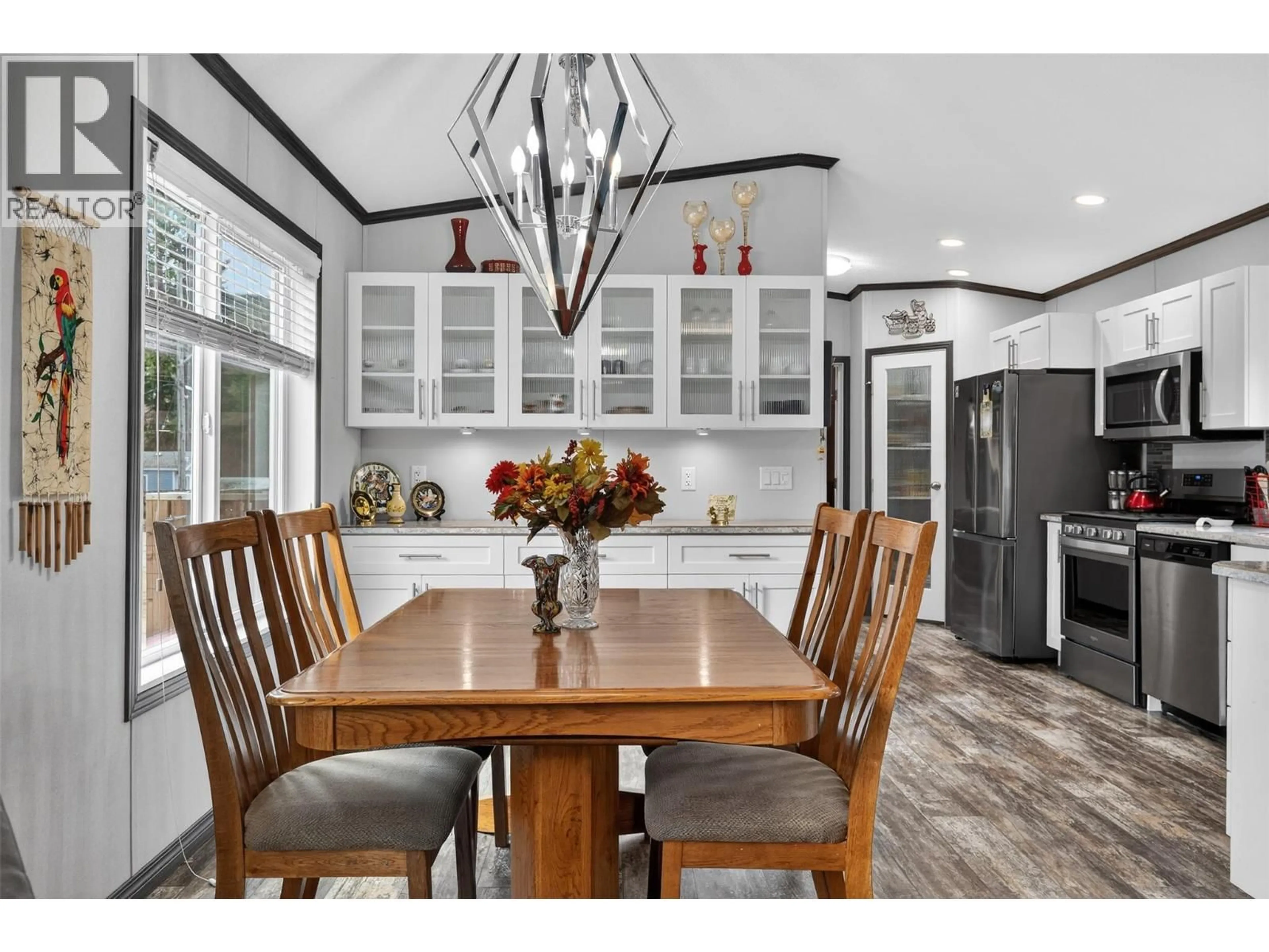 Open concept kitchen, wood/laminate floor for 11 - 5235 SHAW ROAD, Salmon Arm British Columbia V1E4M3