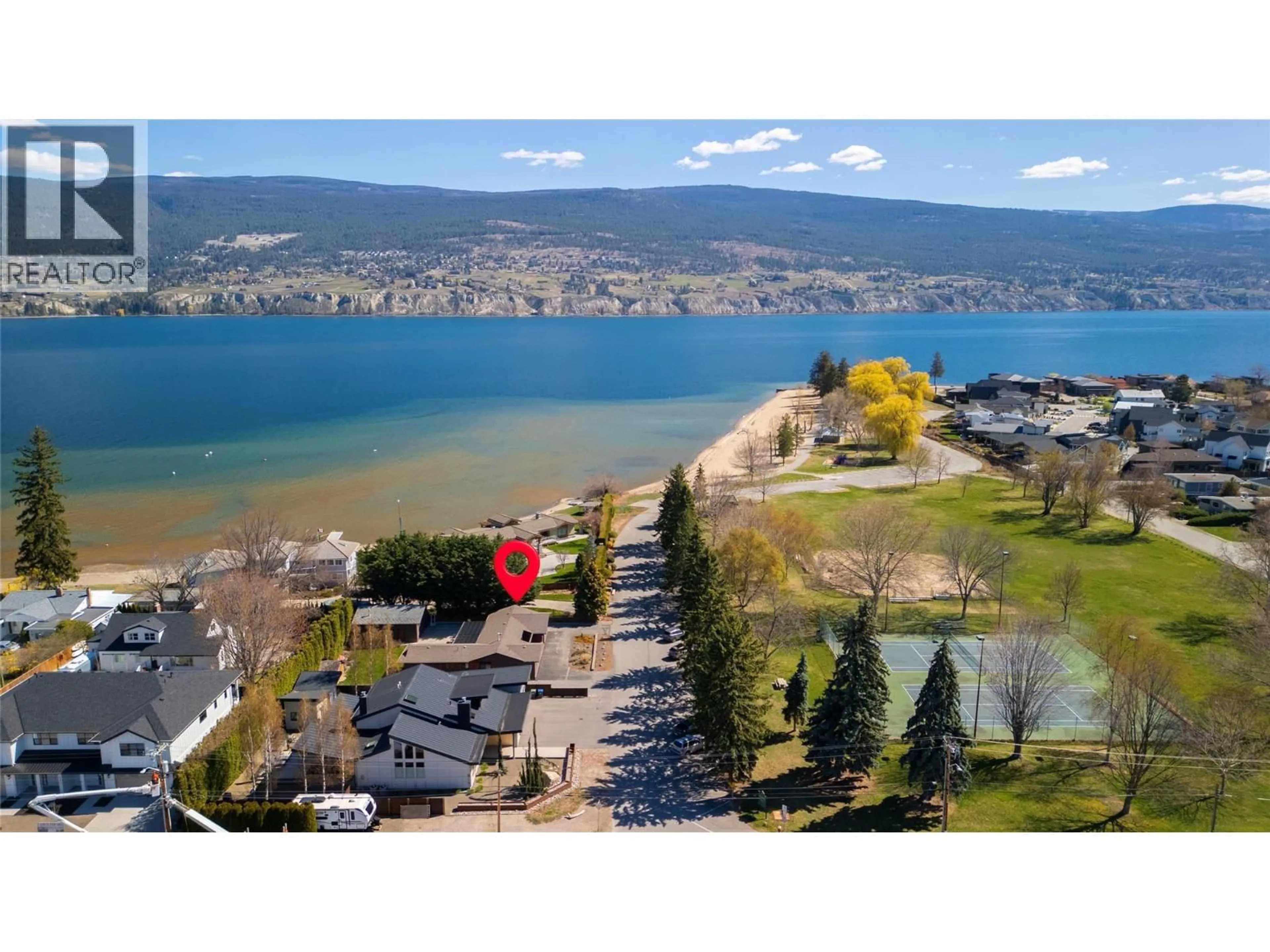 A pic from outside/outdoor area/front of a property/back of a property/a pic from drone, water/lake/river/ocean view for 916 POWELL BEACH ROAD, Summerland British Columbia V0H1Z9