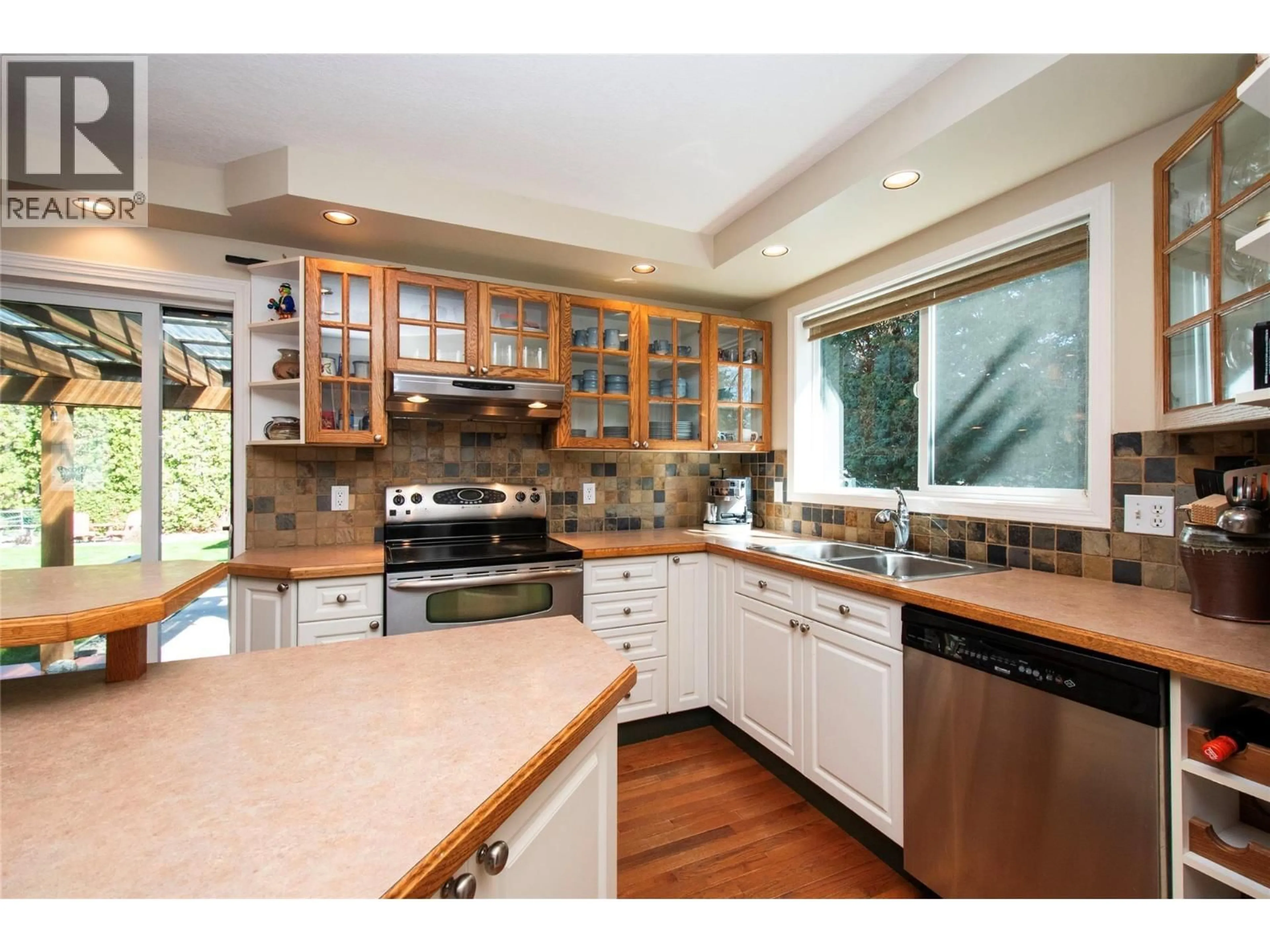 Open concept kitchen, unknown for 916 POWELL BEACH ROAD, Summerland British Columbia V0H1Z9
