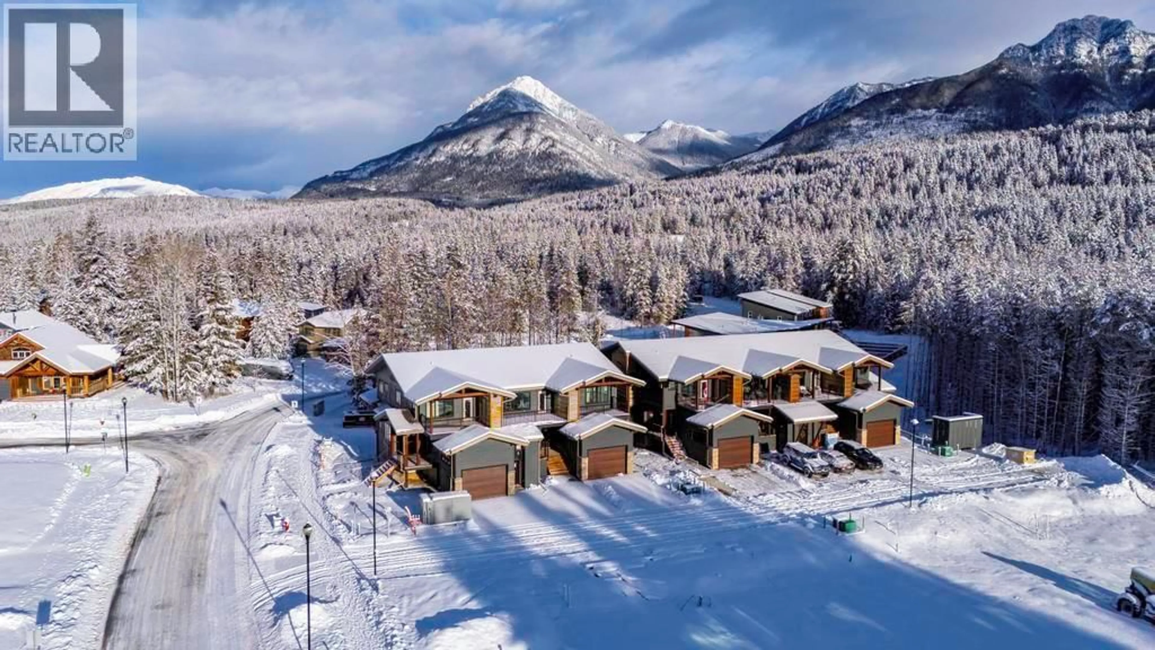 A pic from outside/outdoor area/front of a property/back of a property/a pic from drone, mountain view for 4 - 1444 GRANITE DRIVE, Golden British Columbia V0A1H0