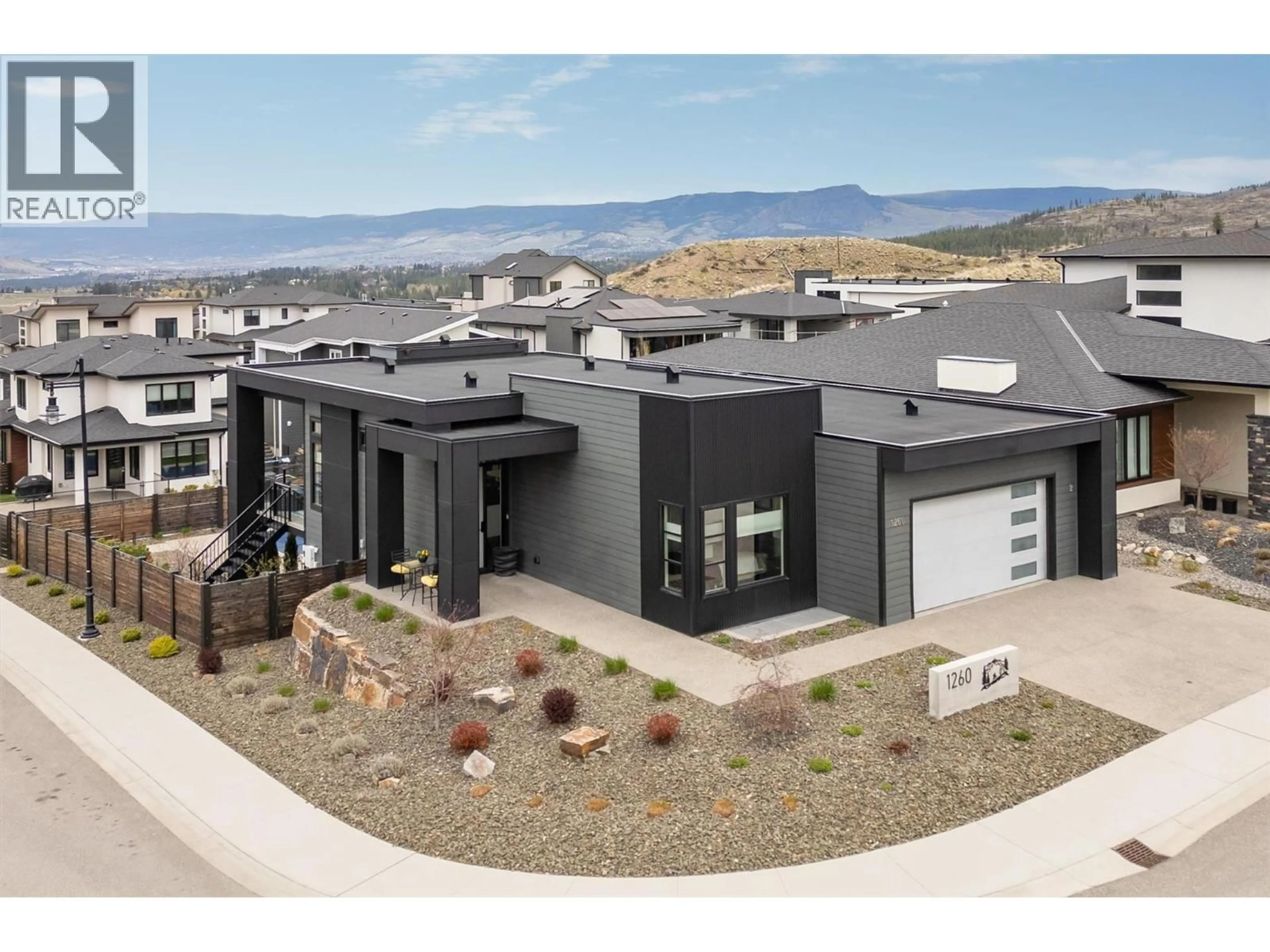 Home with vinyl exterior material, mountain view for 1260 JACK SMITH ROAD, Kelowna British Columbia V1W5N1