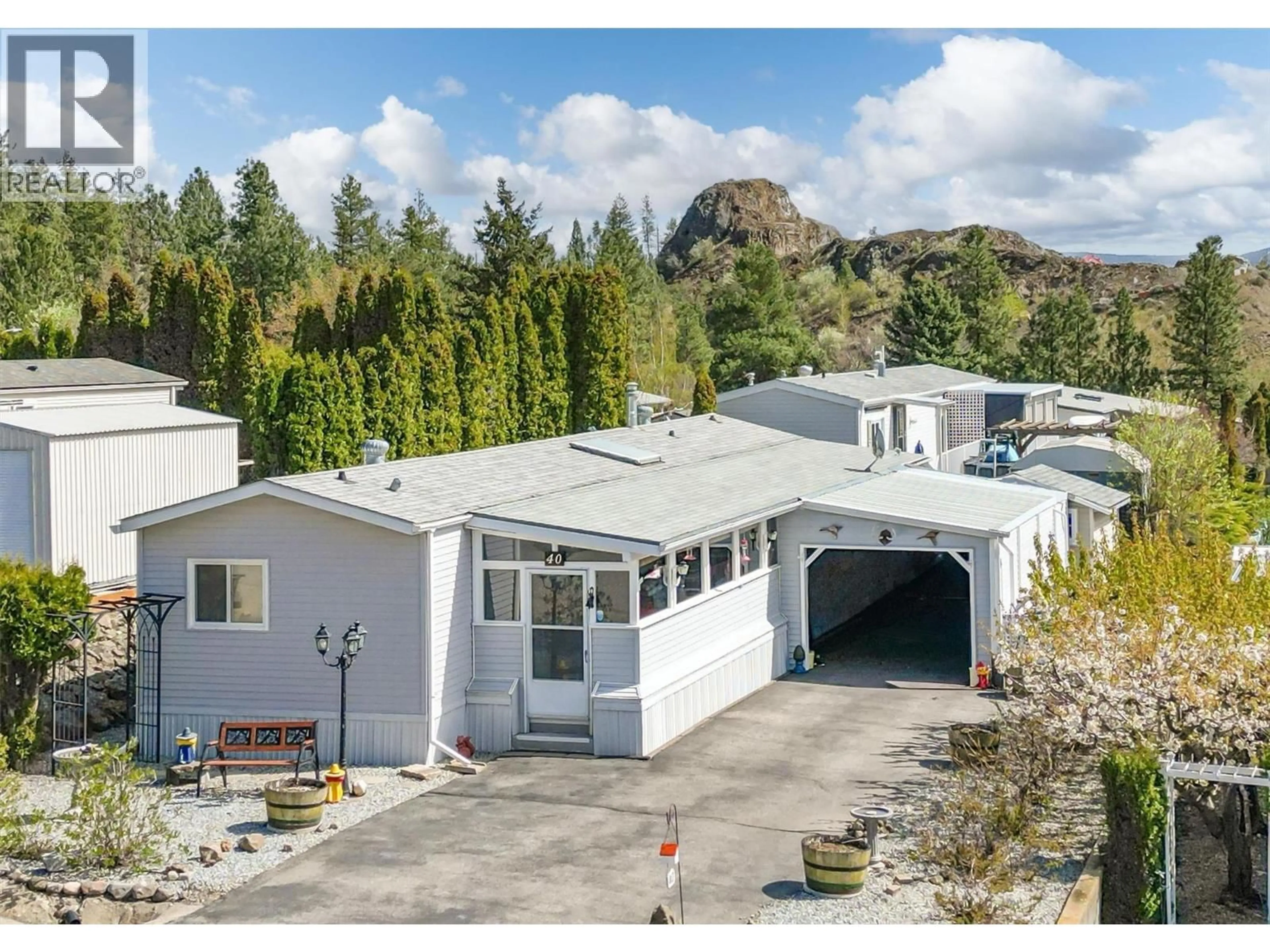 A pic from outside/outdoor area/front of a property/back of a property/a pic from drone, mountain view for 40 - 1750 LENZ ROAD, West Kelowna British Columbia V1Z3N1