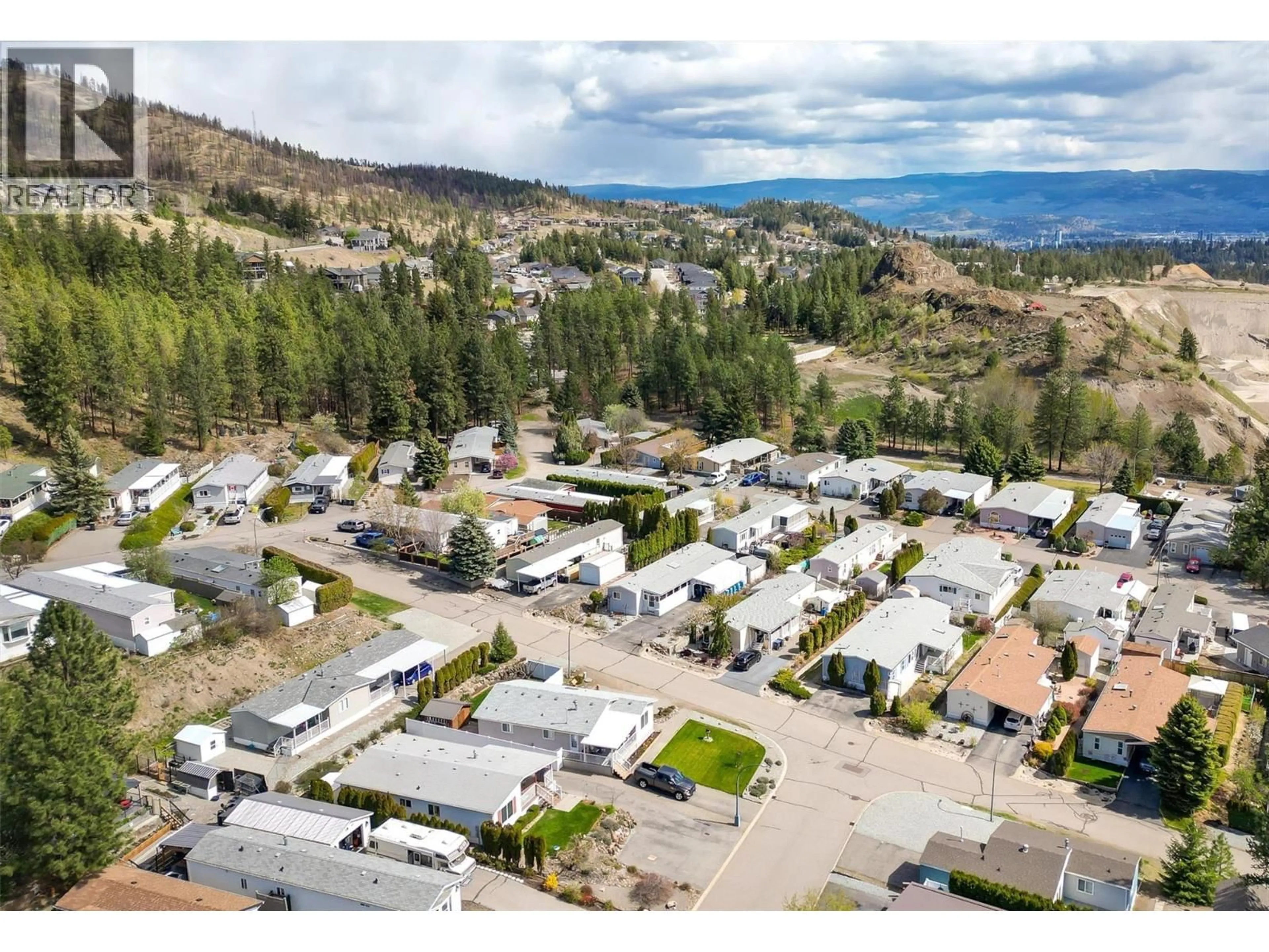 A pic from outside/outdoor area/front of a property/back of a property/a pic from drone, mountain view for 40 - 1750 LENZ ROAD, West Kelowna British Columbia V1Z3N1