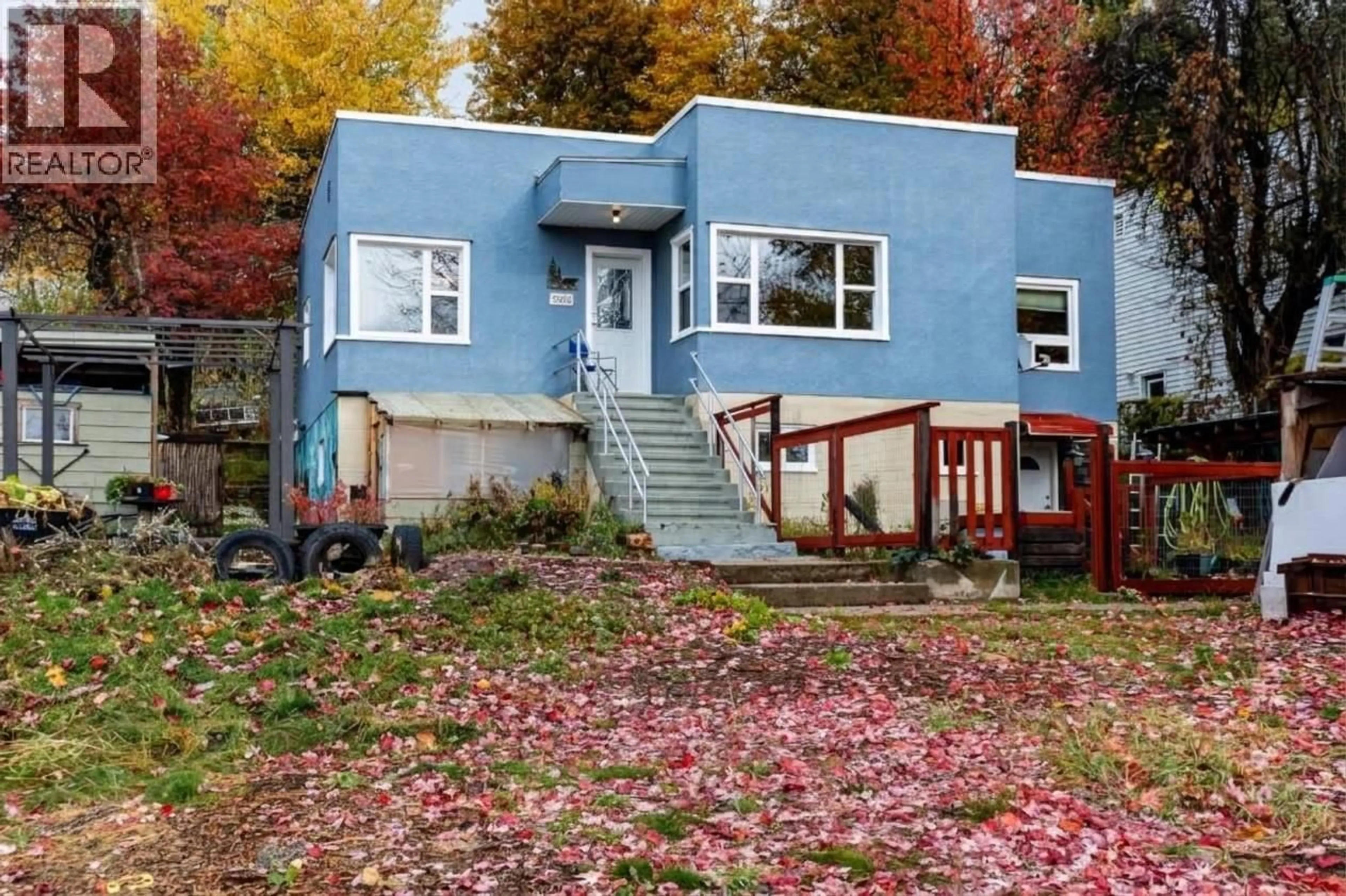 Home with vinyl exterior material, street for 2260 LEROI AVENUE, Rossland British Columbia V0G1Y0