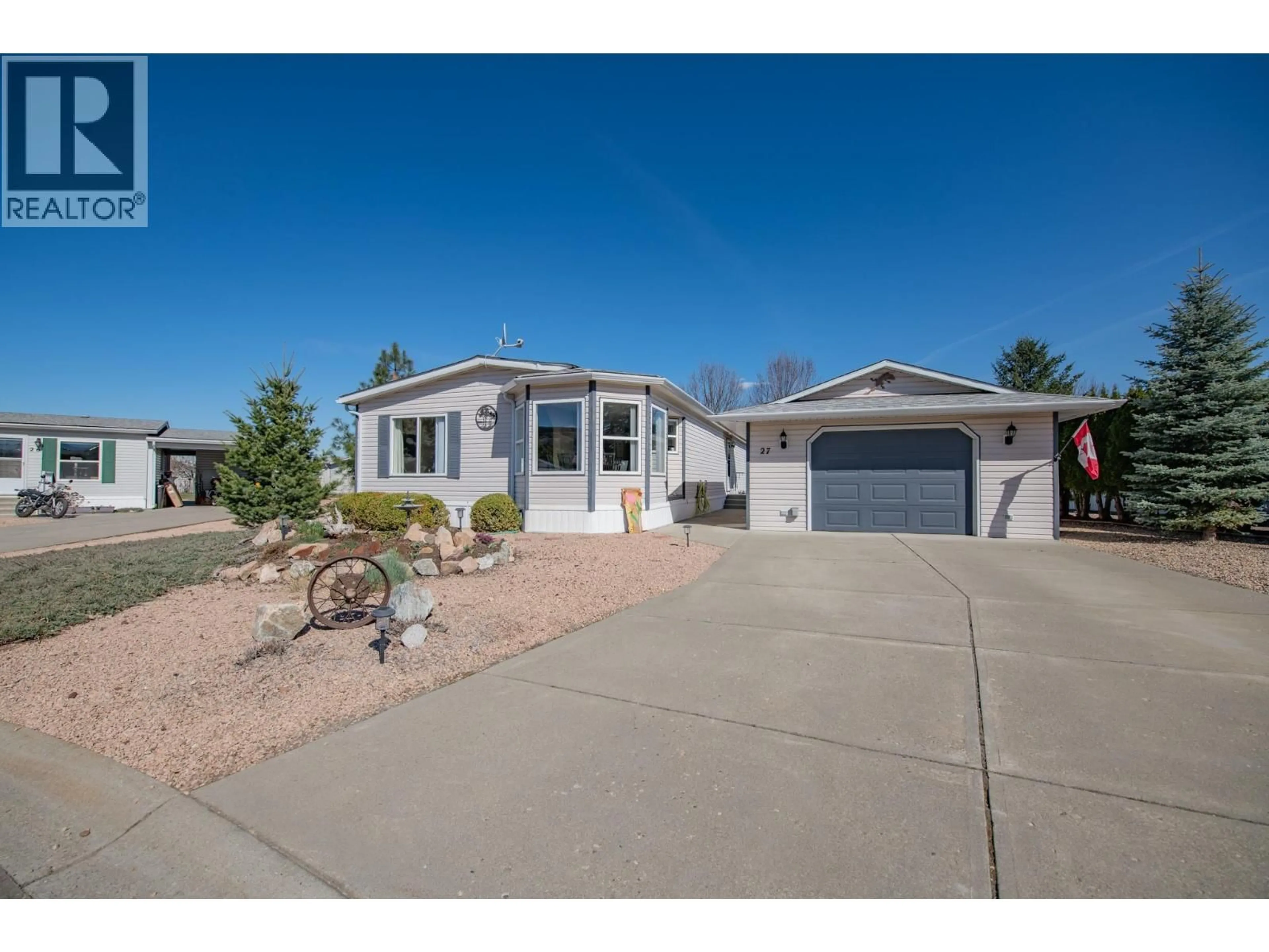 Home with vinyl exterior material, street for 27 - 9510 97 HIGHWAY, Vernon British Columbia V1T6N6