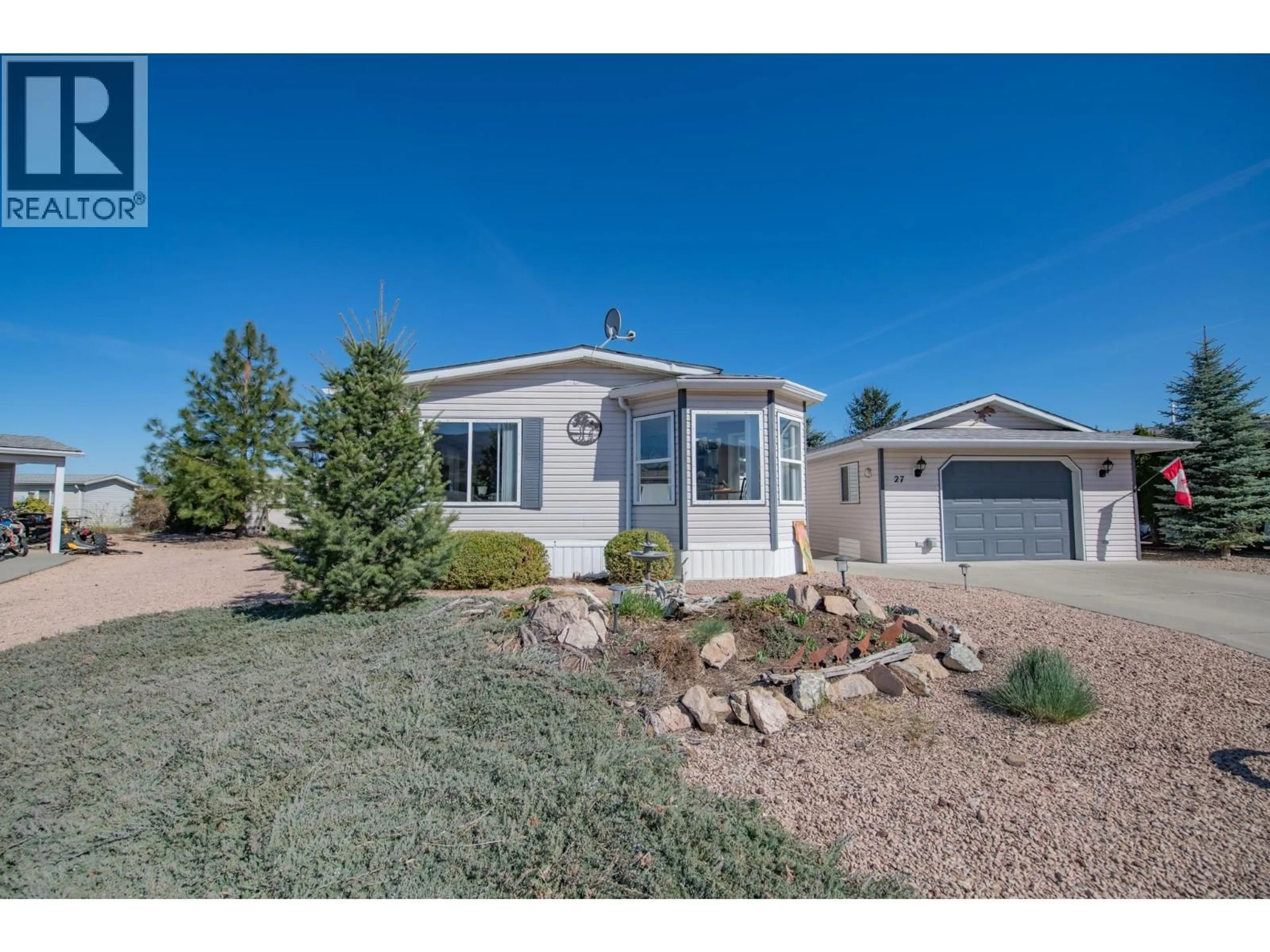 Home with vinyl exterior material, street for 27 - 9510 97 HIGHWAY, Vernon British Columbia V1T6N6