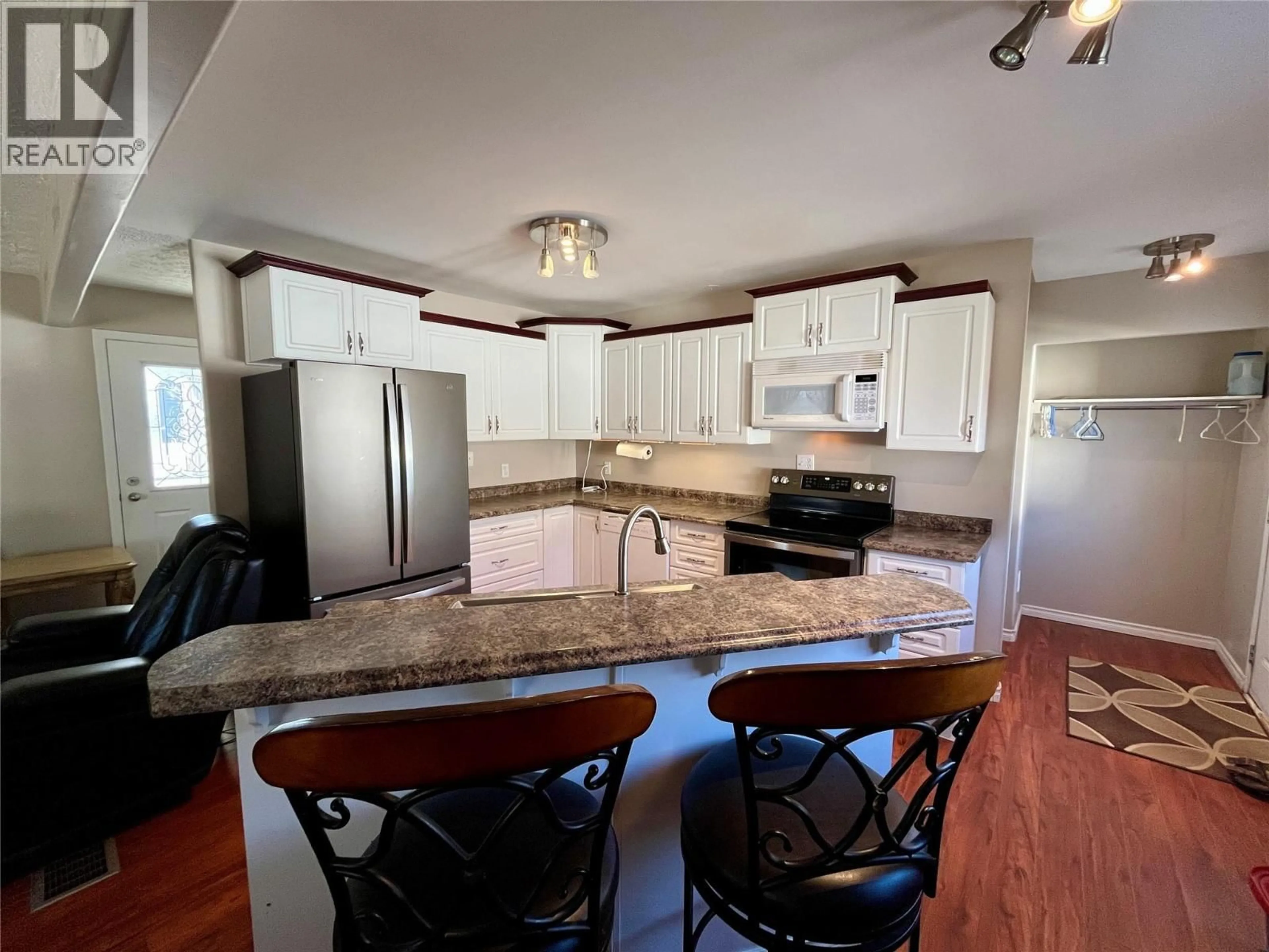 Open concept kitchen, ceramic/tile floor for 167 BERGERON DRIVE, Tumbler Ridge British Columbia V0C2W0