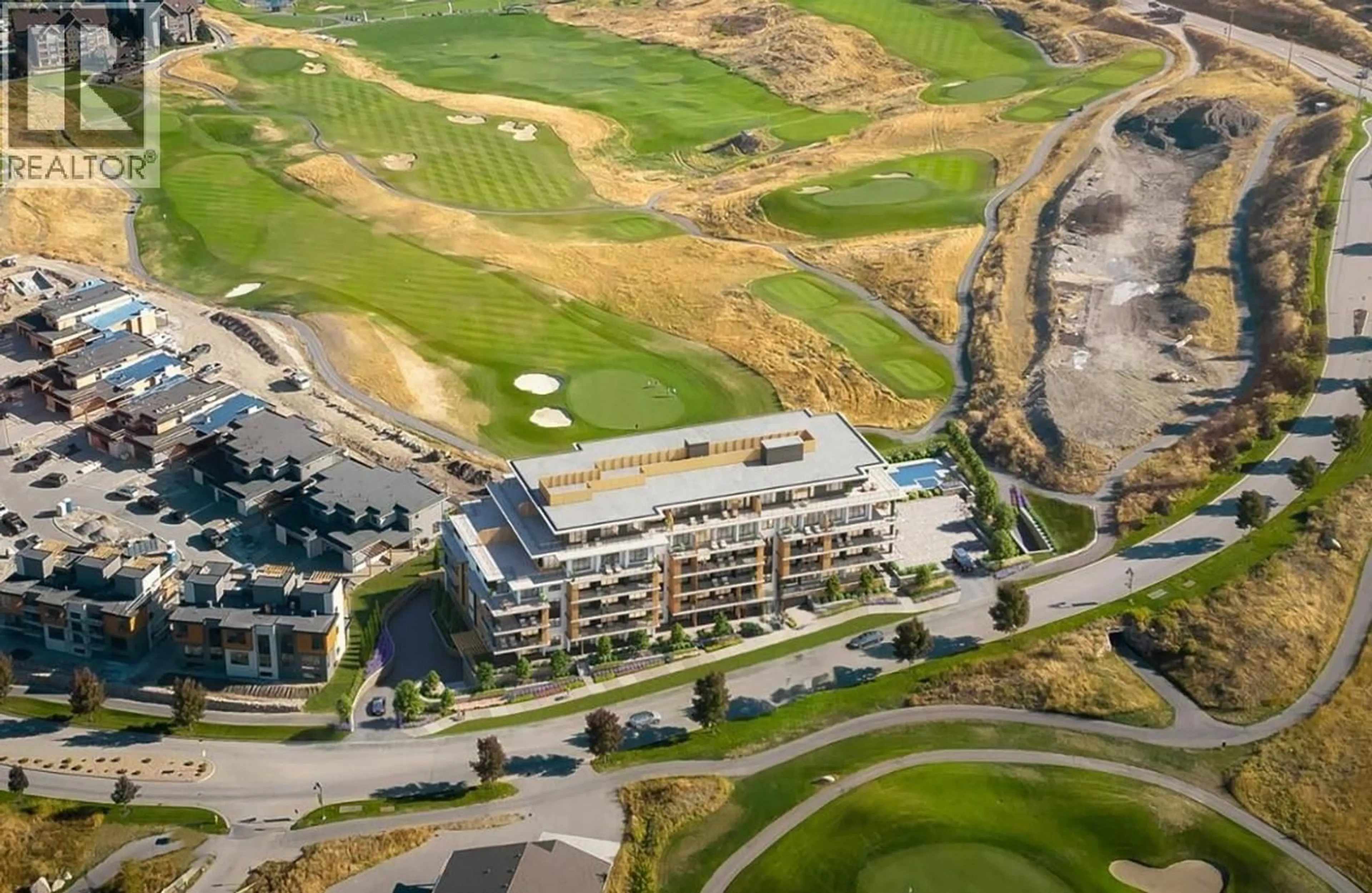 A pic from outside/outdoor area/front of a property/back of a property/a pic from drone, unknown for 205 - 75 PREDATOR RIDGE DRIVE, Vernon British Columbia V1H2H1