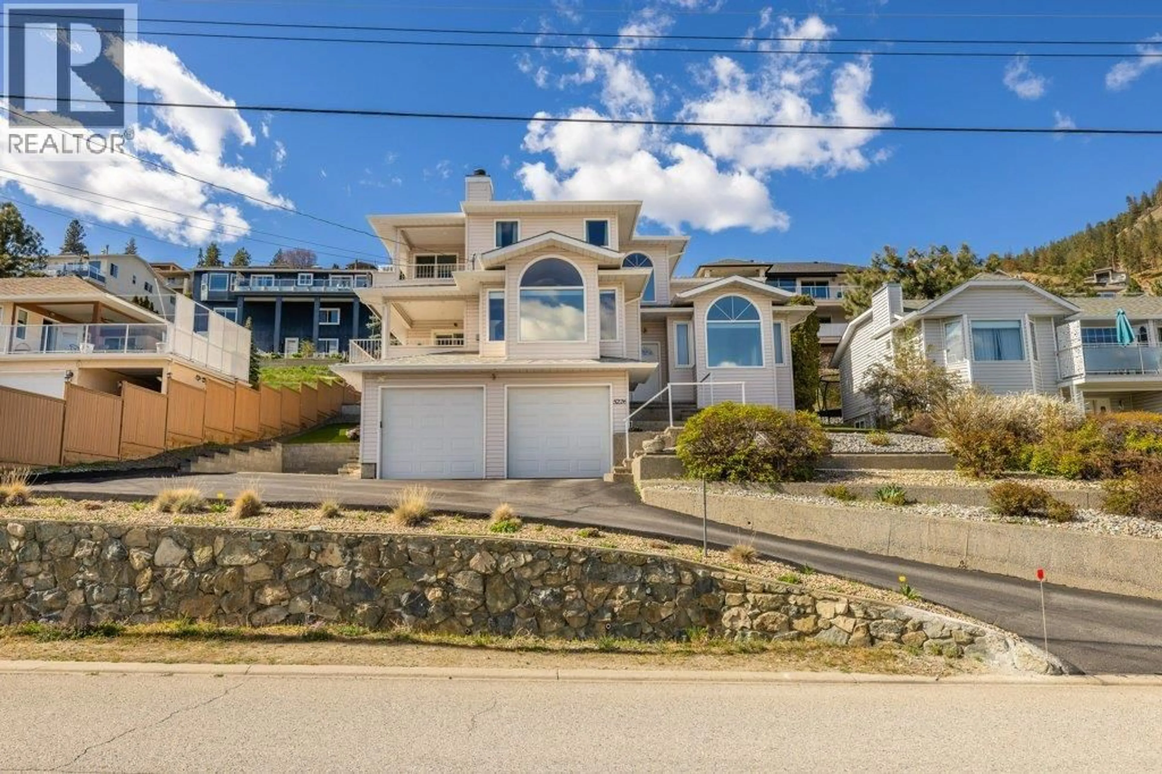 A pic from outside/outdoor area/front of a property/back of a property/a pic from drone, street for 5226 CLARENCE ROAD, Peachland British Columbia V0H1X2