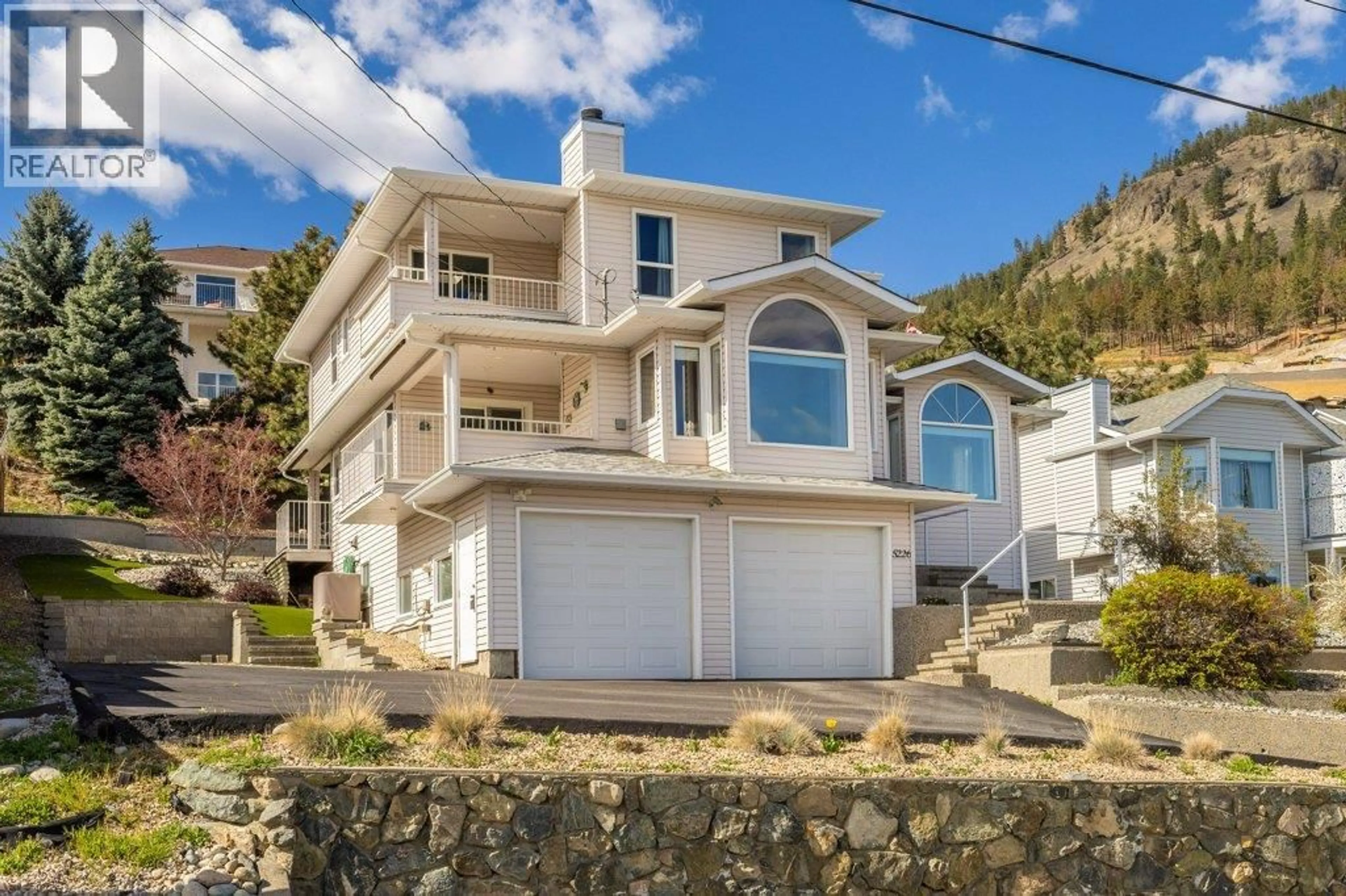 Home with vinyl exterior material, street for 5226 CLARENCE ROAD, Peachland British Columbia V0H1X2