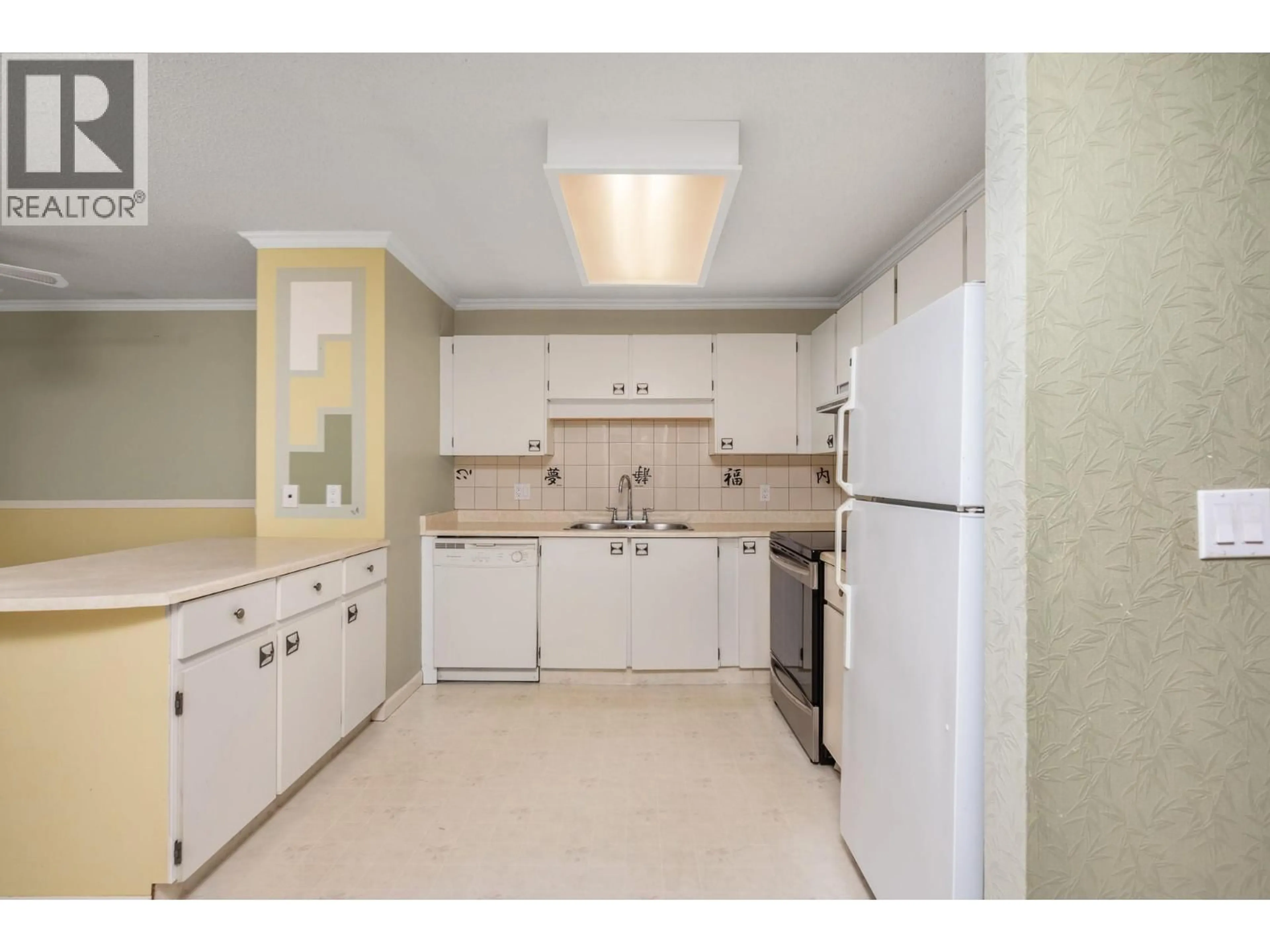 Standard kitchen, ceramic/tile floor for 105 - 3020 ALLENBY WAY, Vernon British Columbia V1T8L4