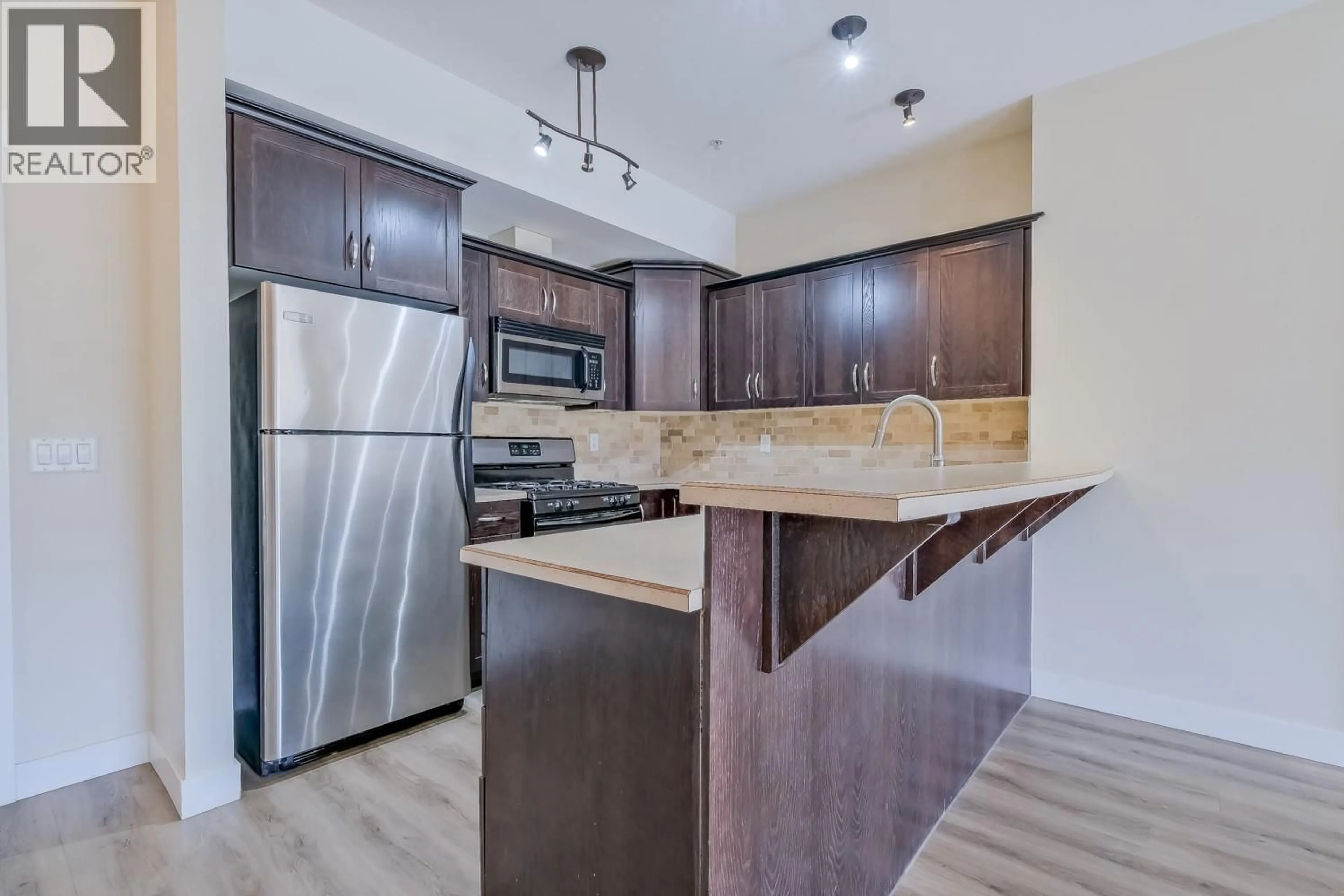 Open concept kitchen, unknown for 308 - 3180 BEAVER LAKE ROAD, Lake Country British Columbia V4V2R5