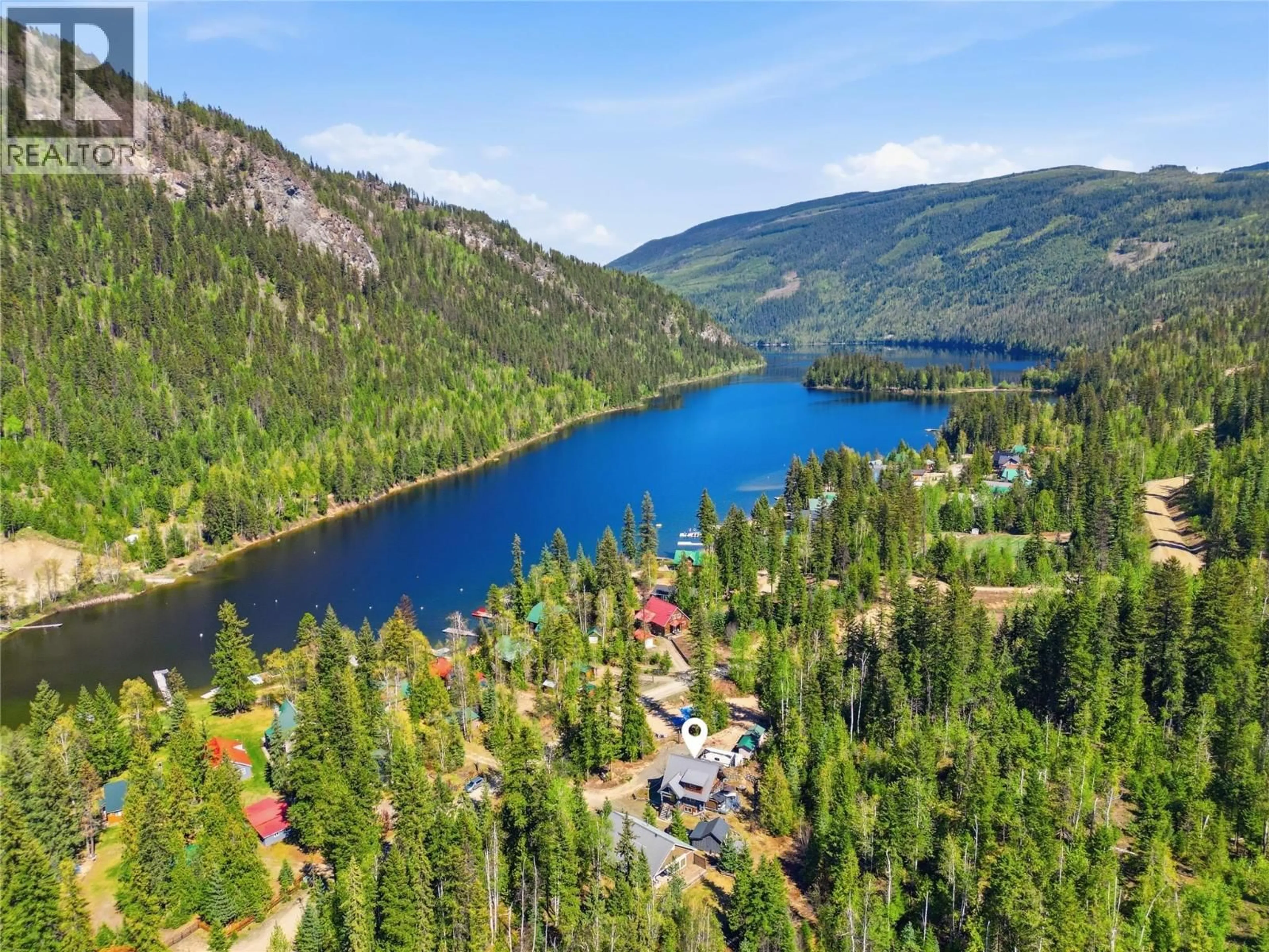 A pic from outside/outdoor area/front of a property/back of a property/a pic from drone, water/lake/river/ocean view for 4285 BARRIERE LAKE FS E ROAD, Barriere British Columbia V0E1E1