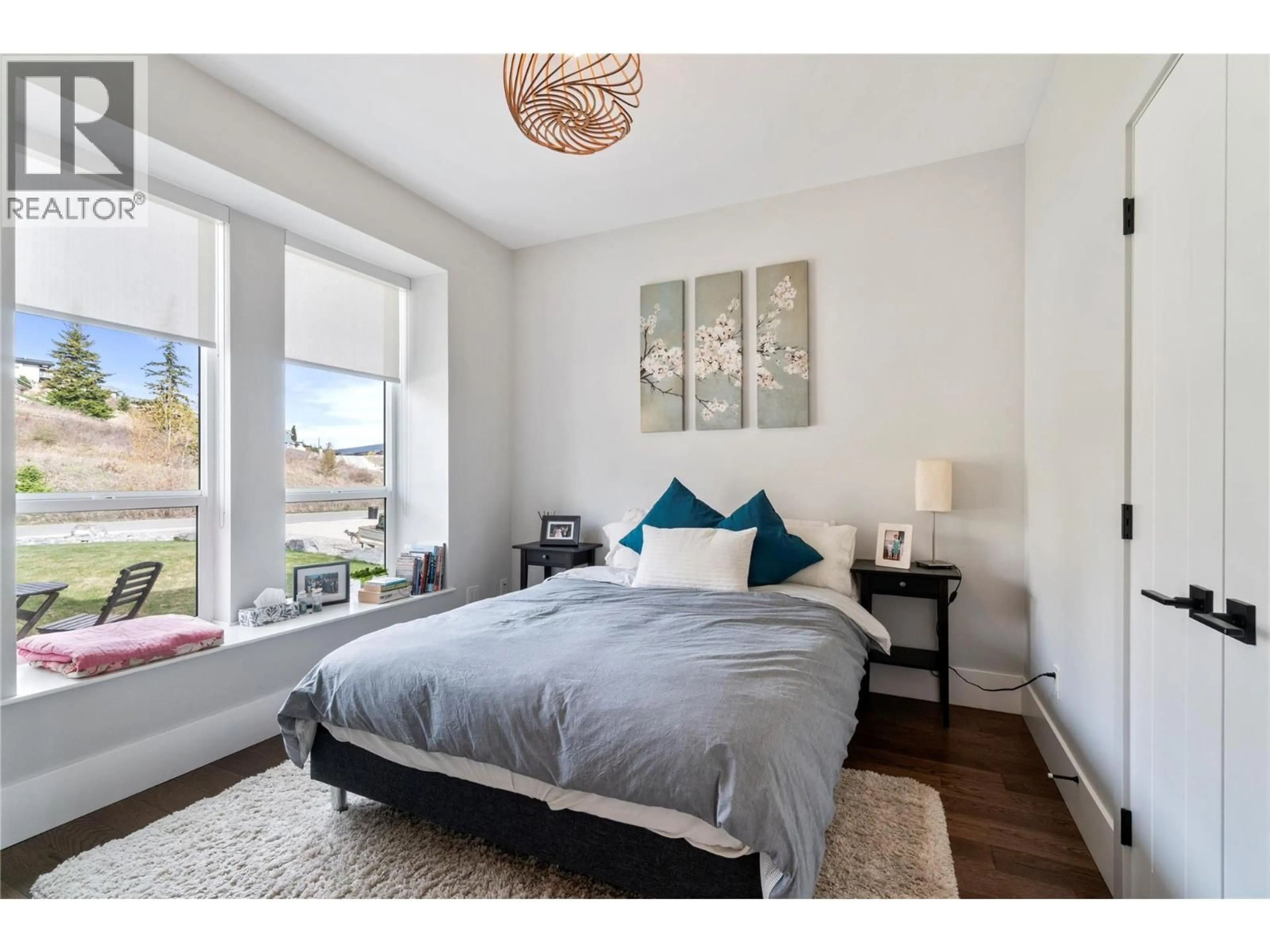 Bedroom with bed, wood/laminate floor for 2510 HIGHLANDS DRIVE, Blind Bay British Columbia V0E1H2