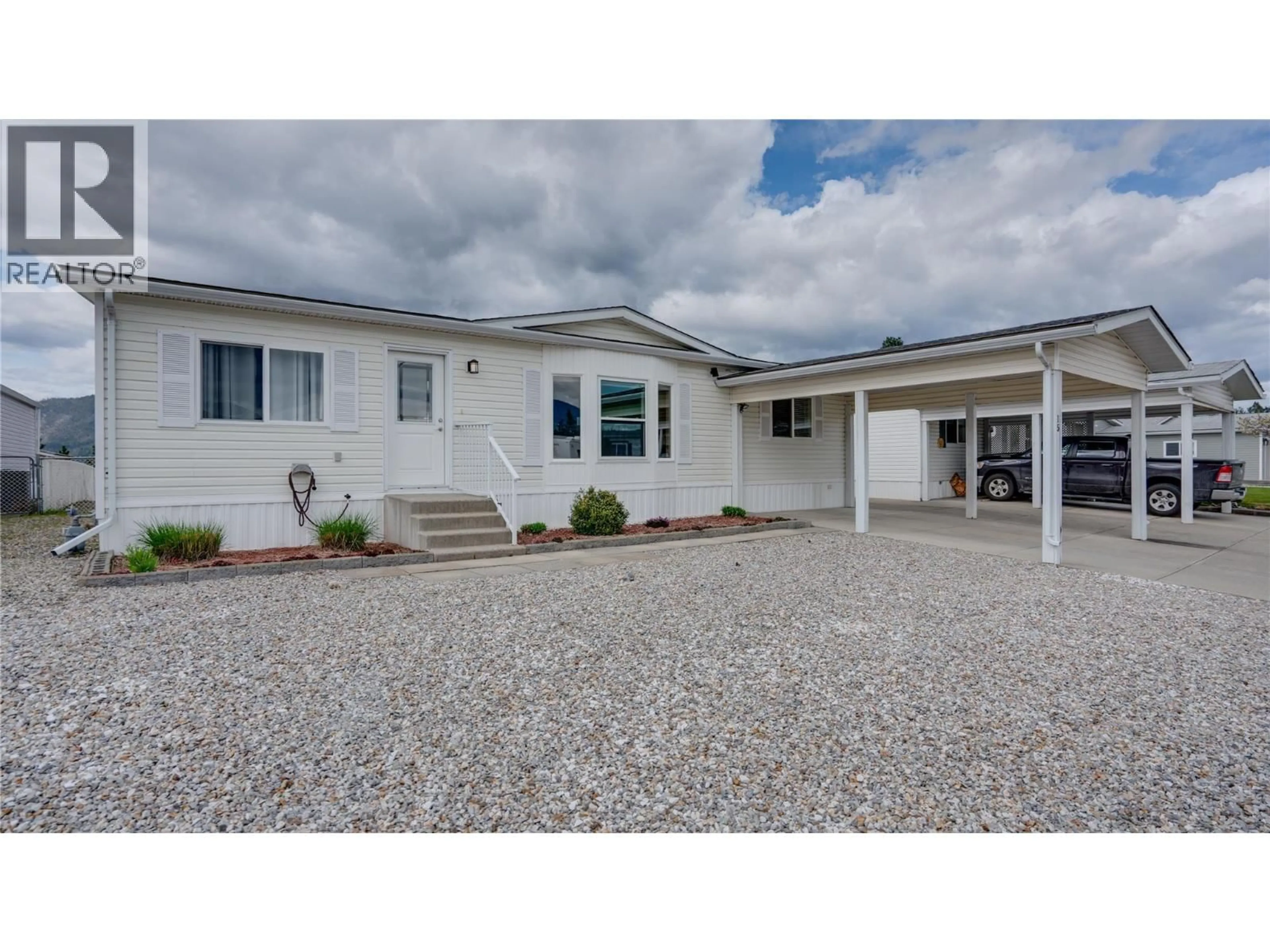 Home with vinyl exterior material, street for 15 - 9510 HIGHWAY 97N HIGHWAY, Vernon British Columbia V1H1R8