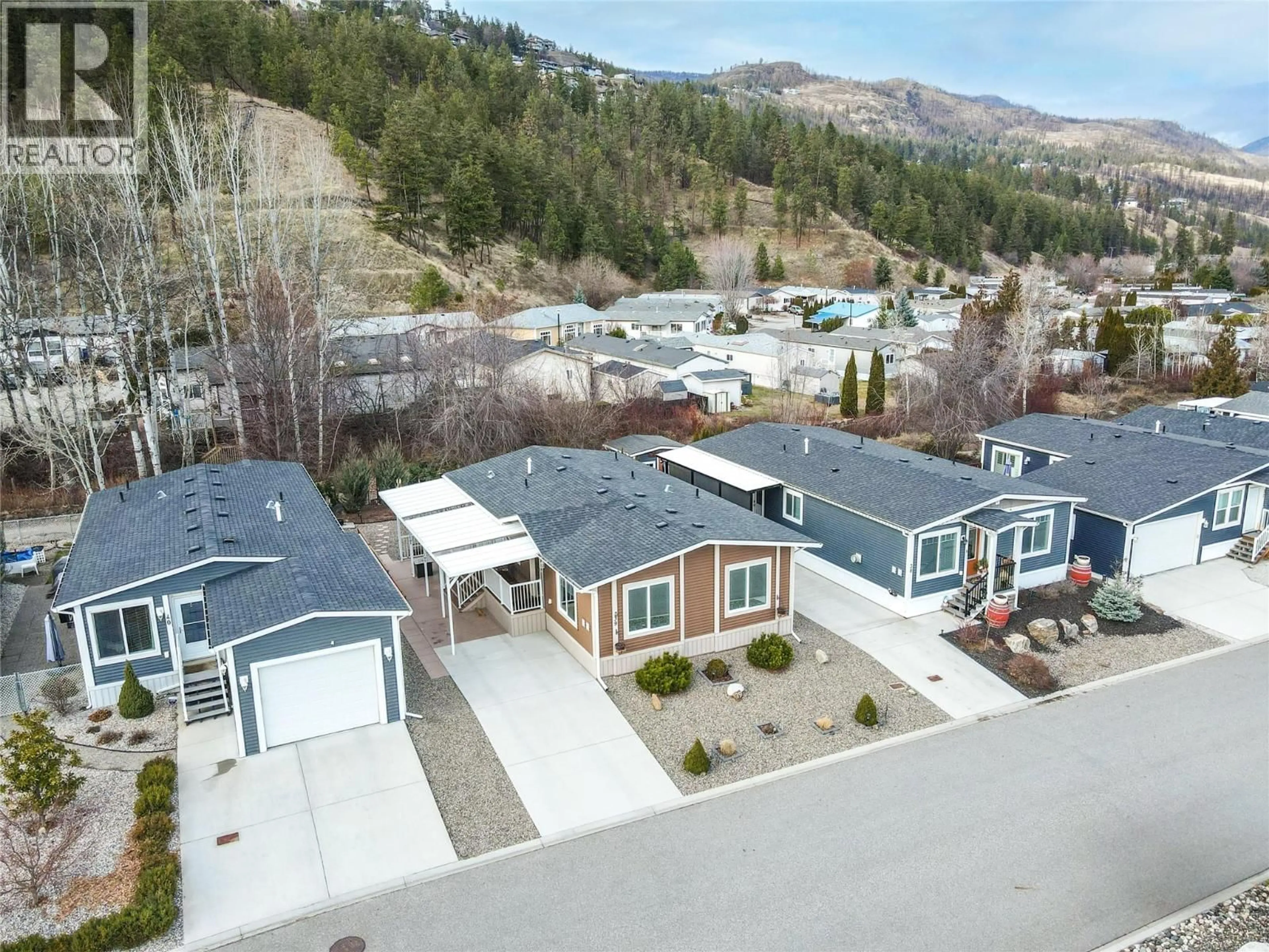 A pic from outside/outdoor area/front of a property/back of a property/a pic from drone, mountain view for 39 - 1835 NANCEE WAY COURT, Kelowna British Columbia V1Z4C1