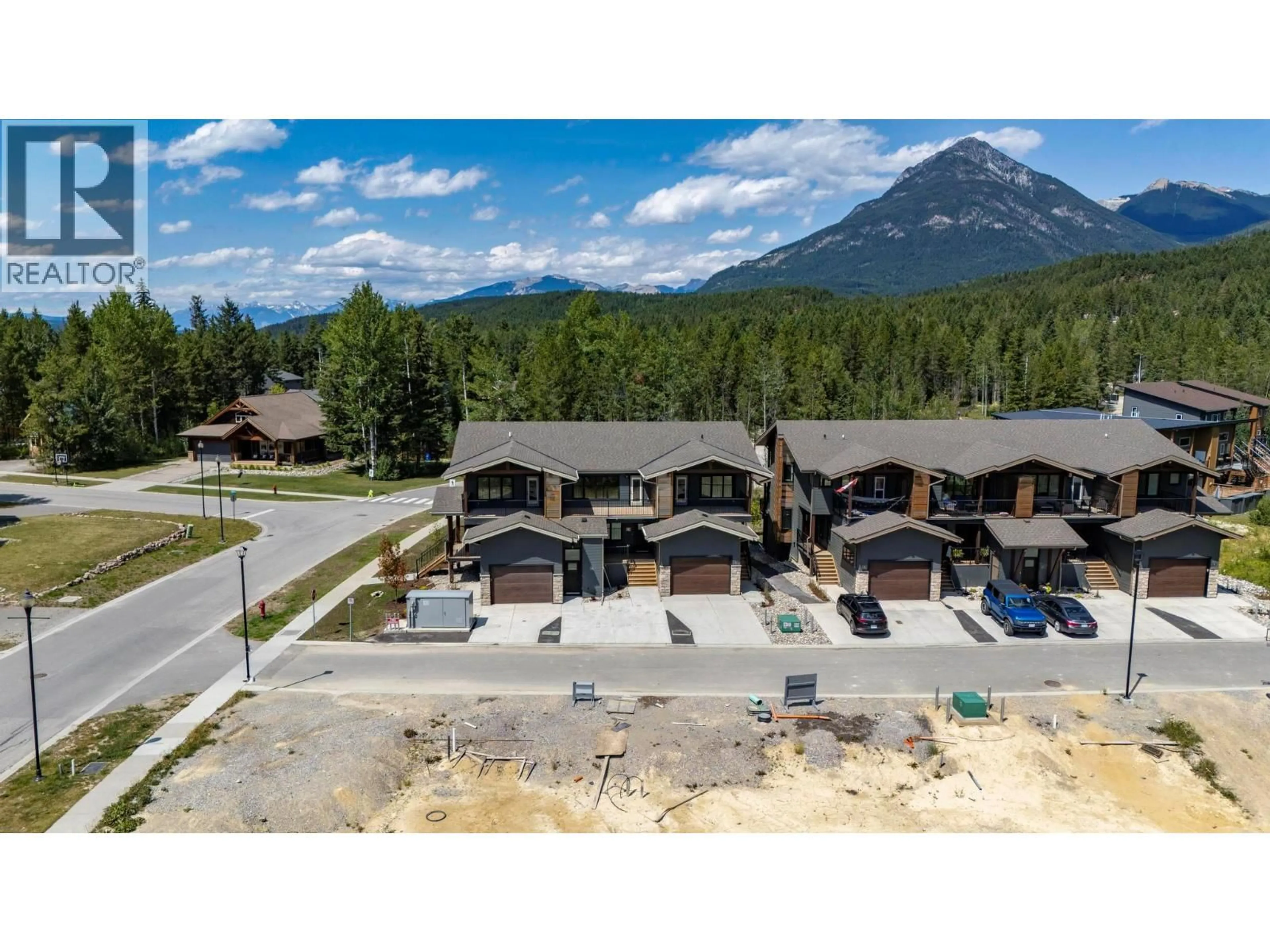 A pic from outside/outdoor area/front of a property/back of a property/a pic from drone, mountain view for 3 - 1444 GRANITE DRIVE, Golden British Columbia V0A1H0