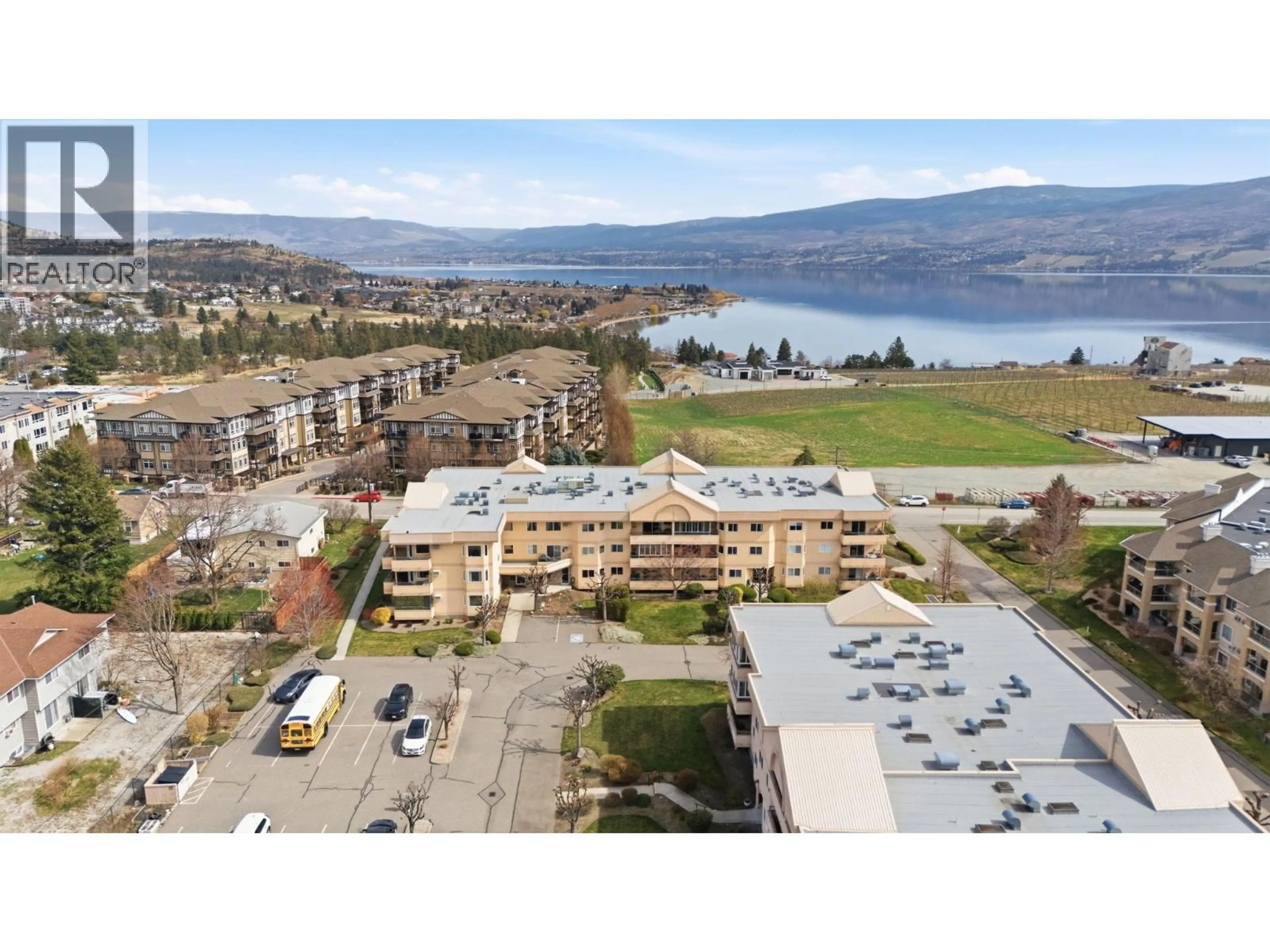 A pic from outside/outdoor area/front of a property/back of a property/a pic from drone, water/lake/river/ocean view for 203 - 3850 BROWN ROAD, West Kelowna British Columbia V4T2J5