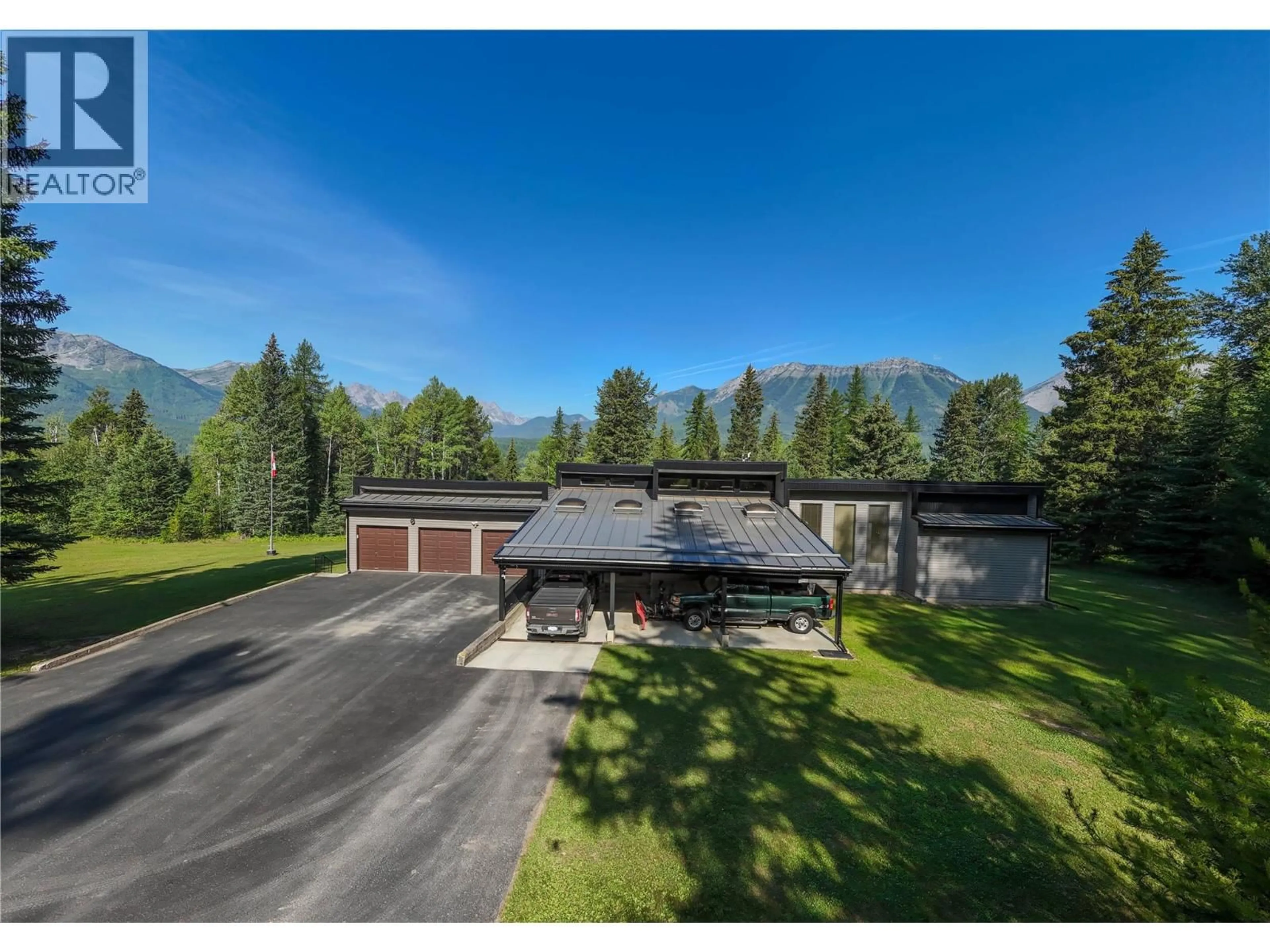 A pic from outside/outdoor area/front of a property/back of a property/a pic from drone, mountain view for 105 CASTLE MOUNTAIN ROAD, Fernie British Columbia V0B1M4