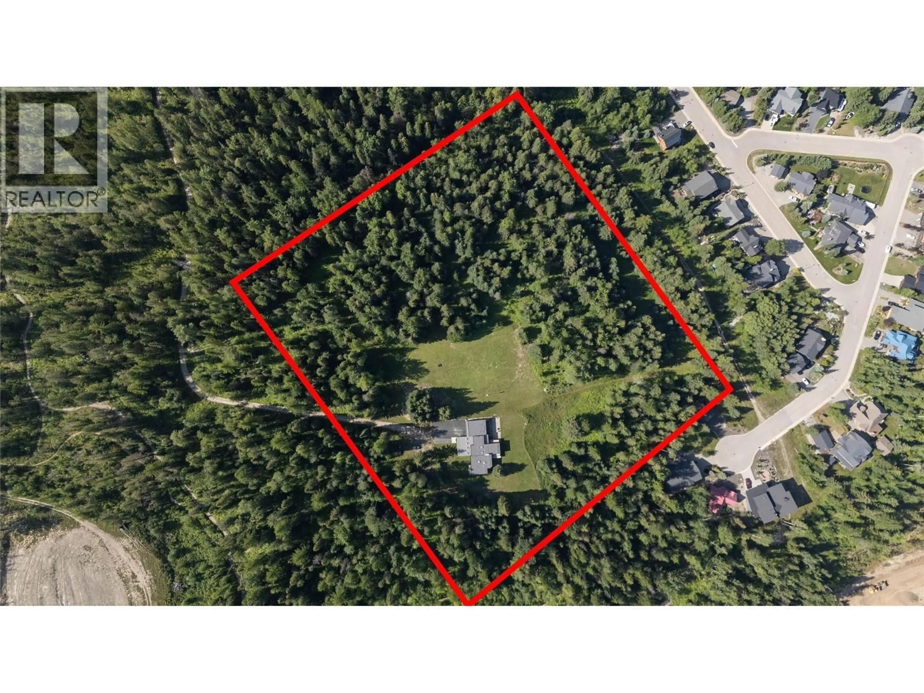 A pic from outside/outdoor area/front of a property/back of a property/a pic from drone, forest/trees view for 105 CASTLE MOUNTAIN ROAD, Fernie British Columbia V0B1M4