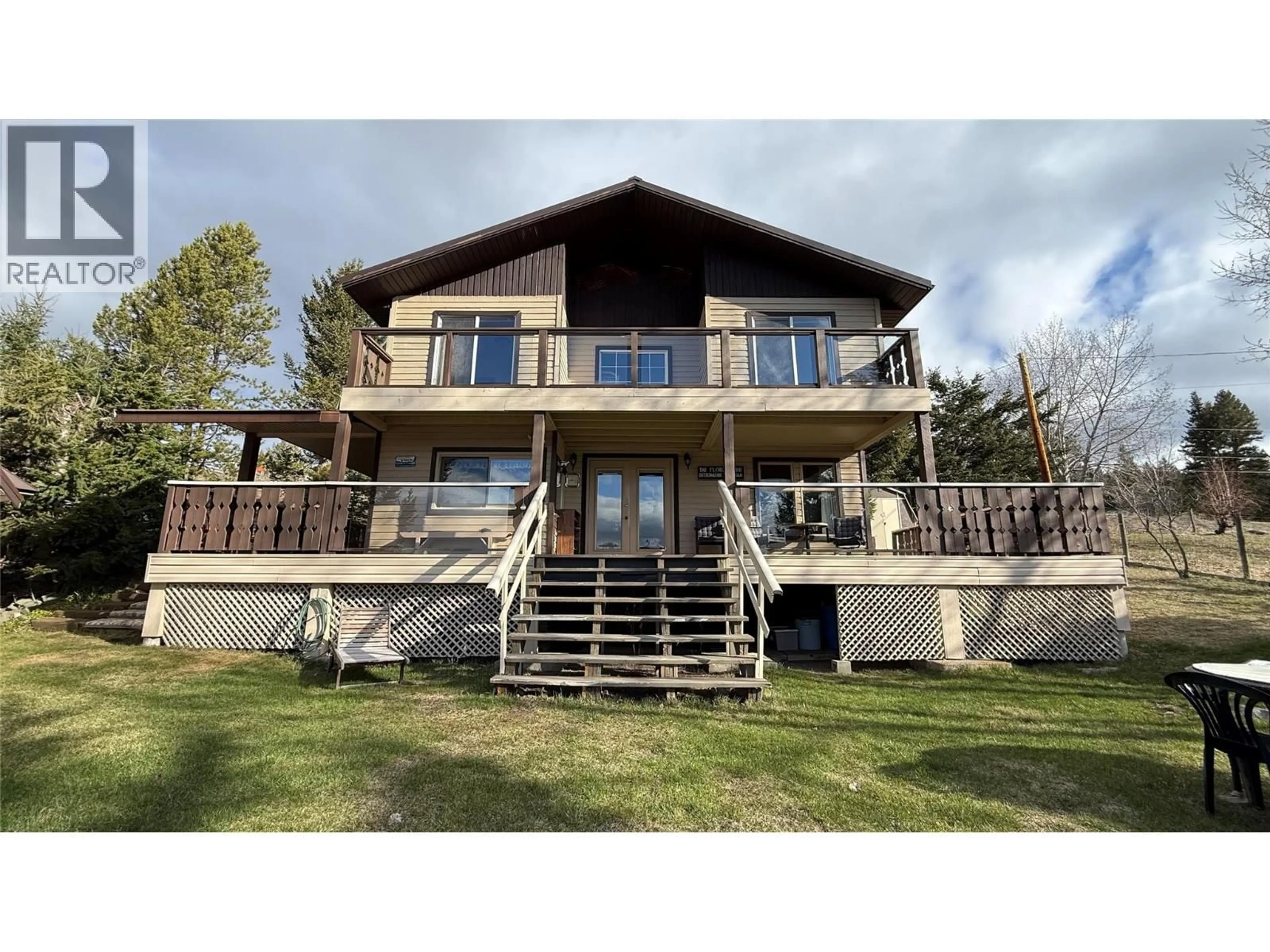 A pic from outside/outdoor area/front of a property/back of a property/a pic from drone, building for 5008 LAUDER ROAD, Merritt British Columbia V1K1B8