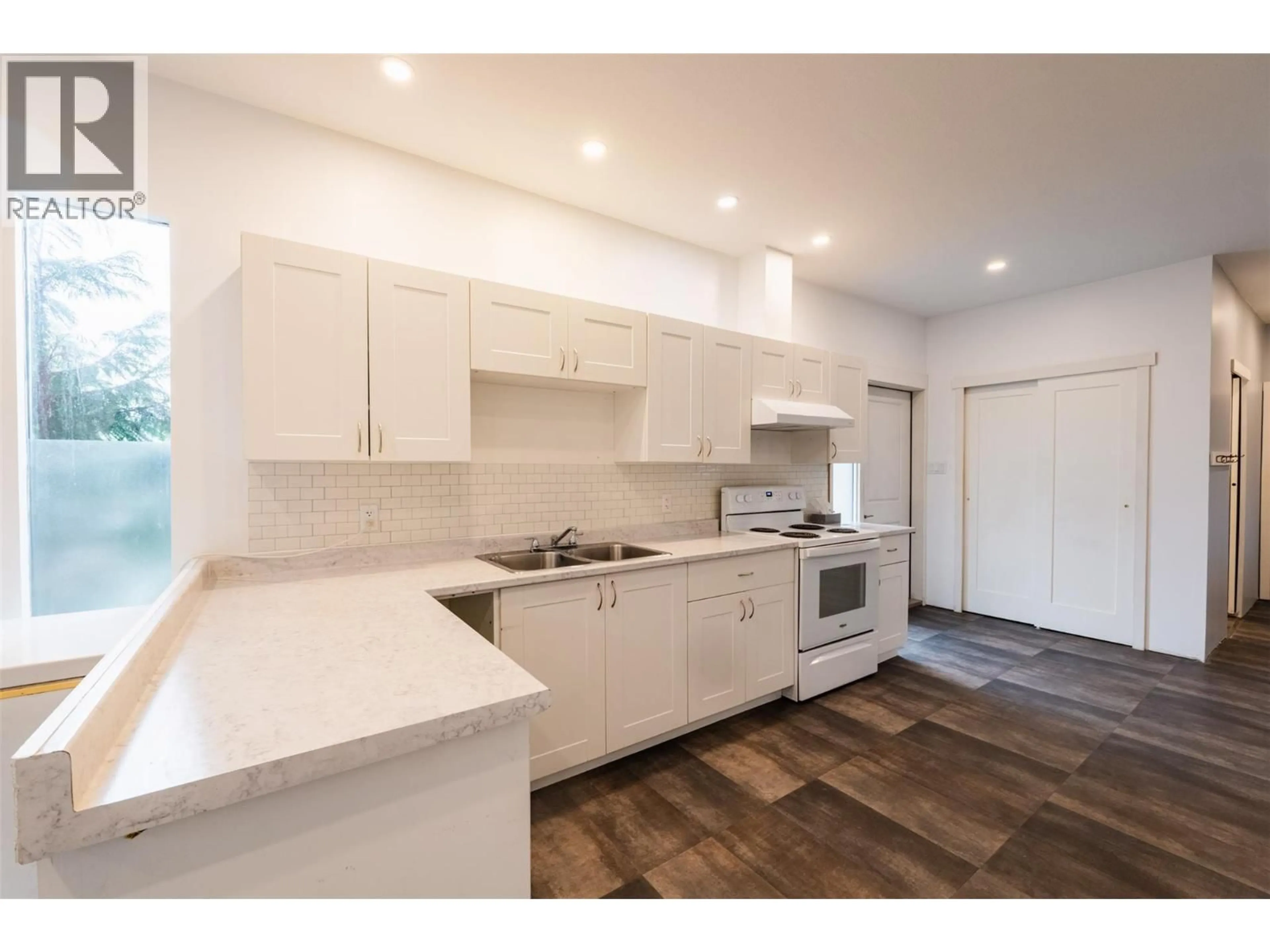 Open concept kitchen, ceramic/tile floor for 3118 SLOCAN PARK ROAD, Slocan Park British Columbia V0G2E0