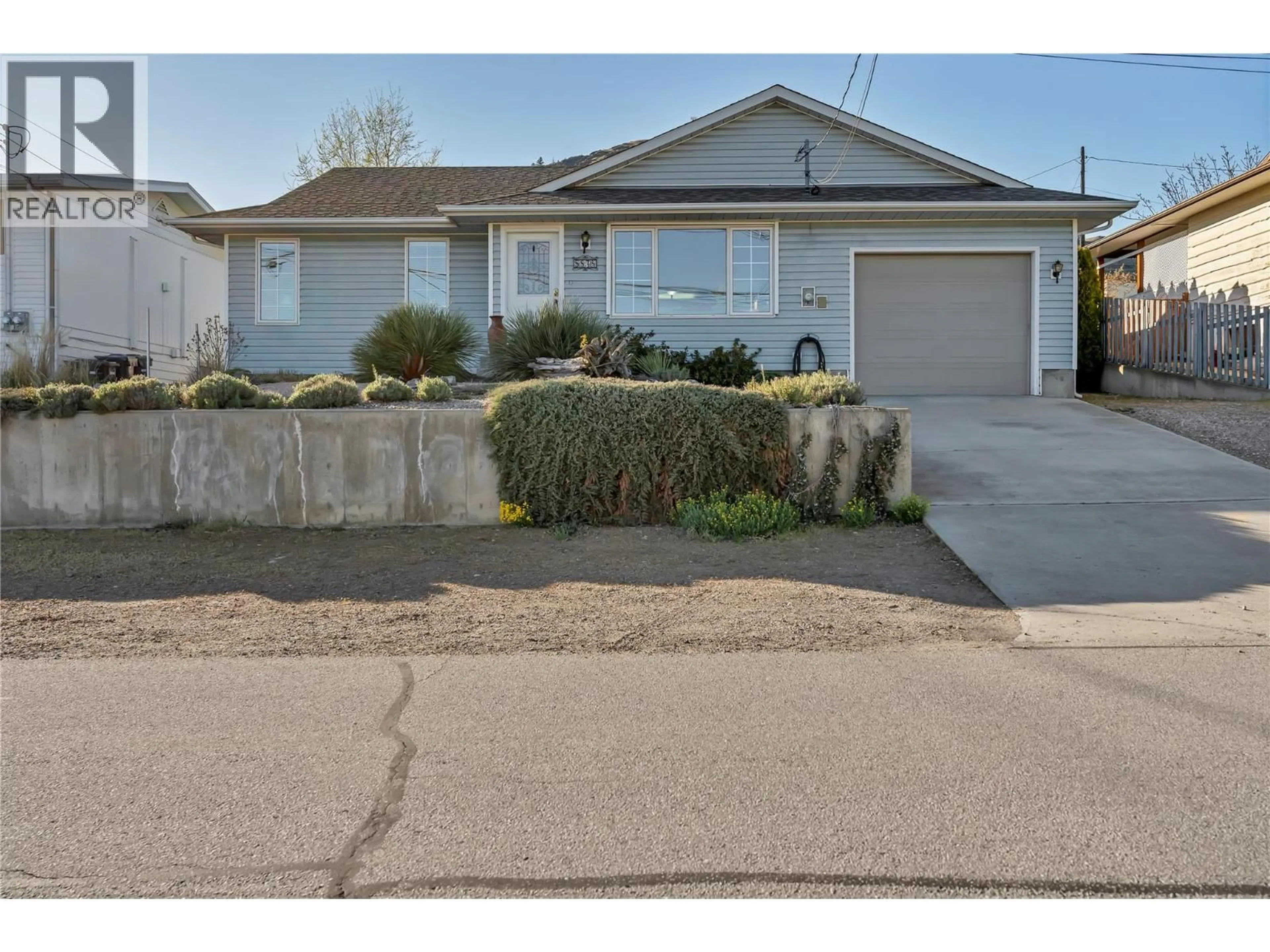 Home with vinyl exterior material, street for 5878 TULAMEEN STREET, Oliver British Columbia V0H1T0